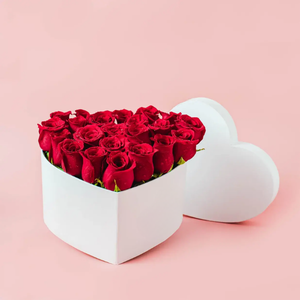 24 red roses in a heart-shaped box - Capital Flores with same-day home delivery