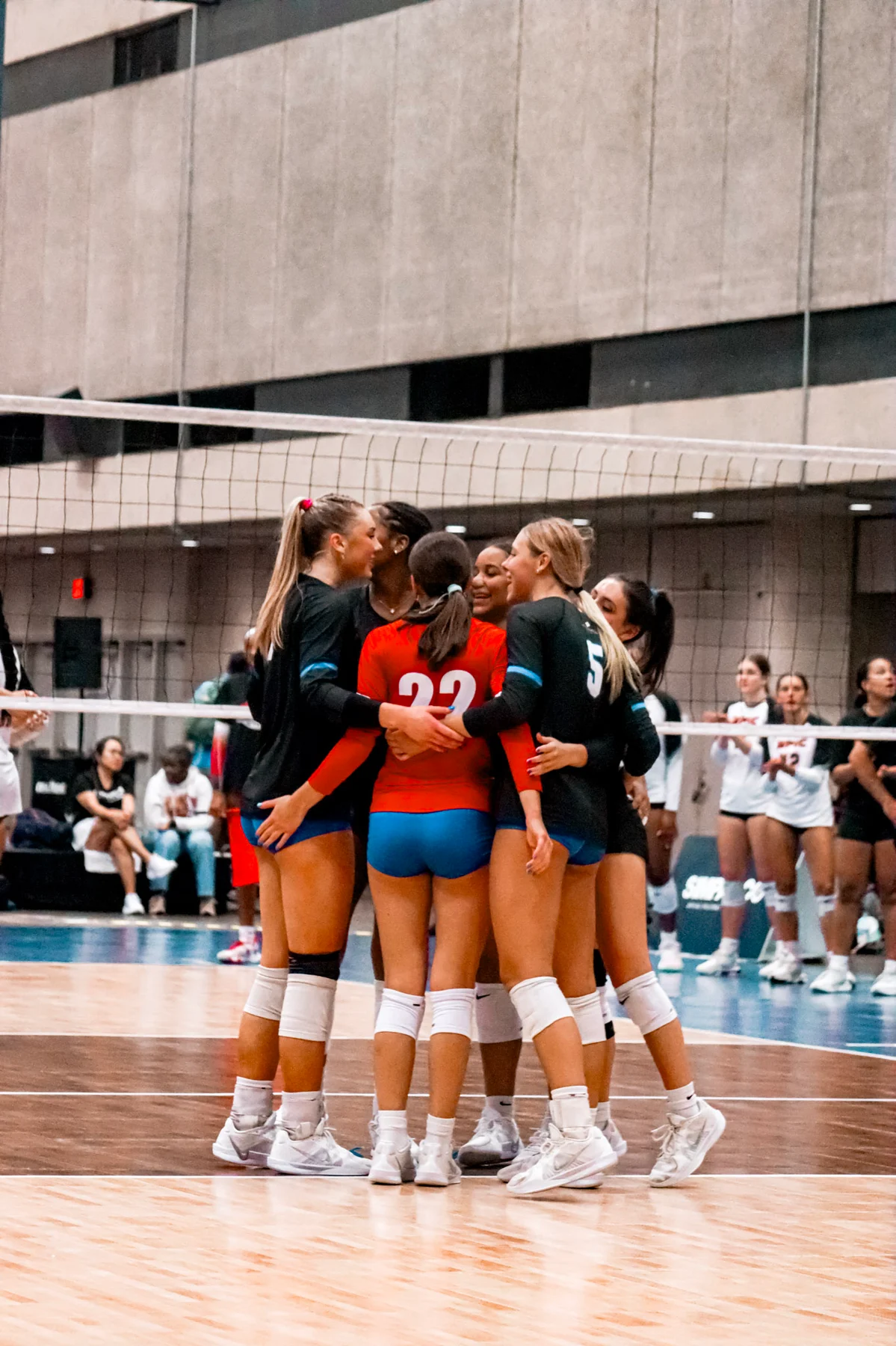 A group of athletes celebrating.