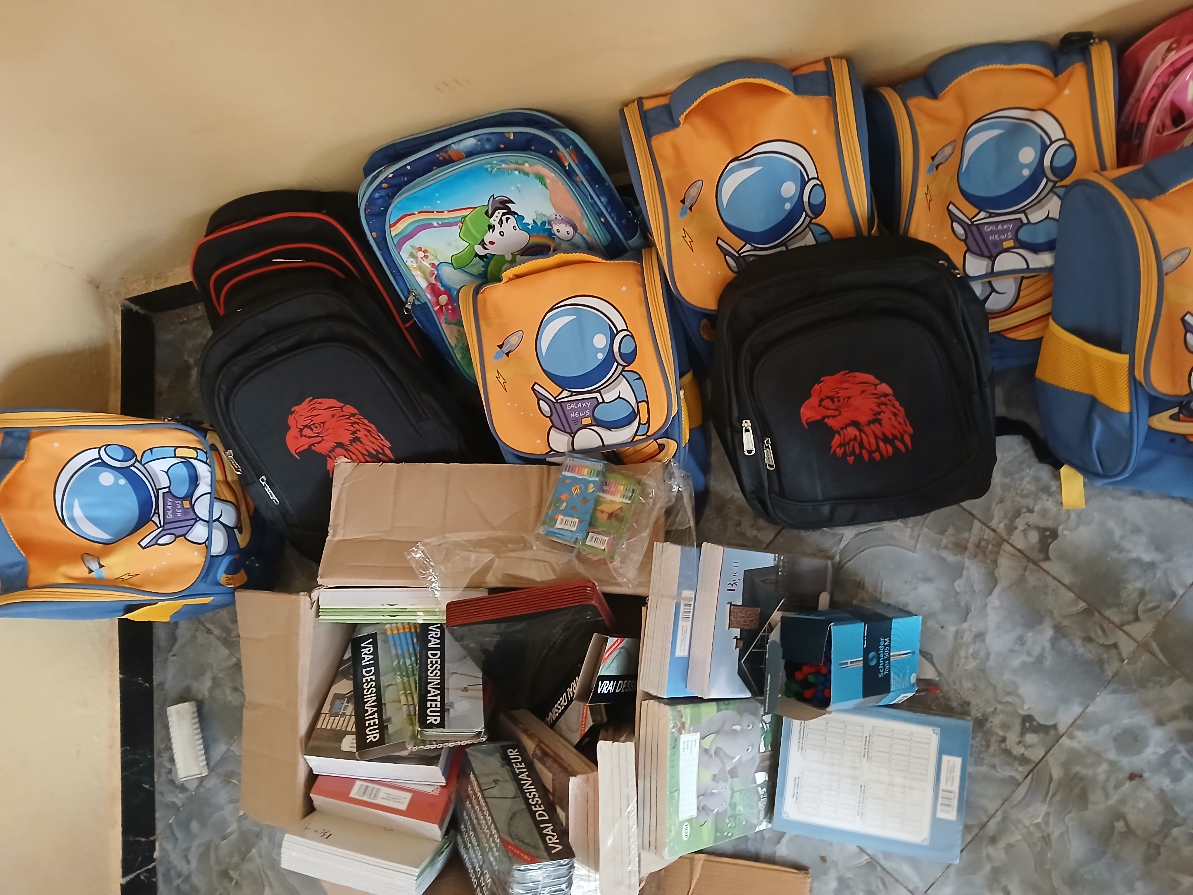 Children happy with their new school supplies.