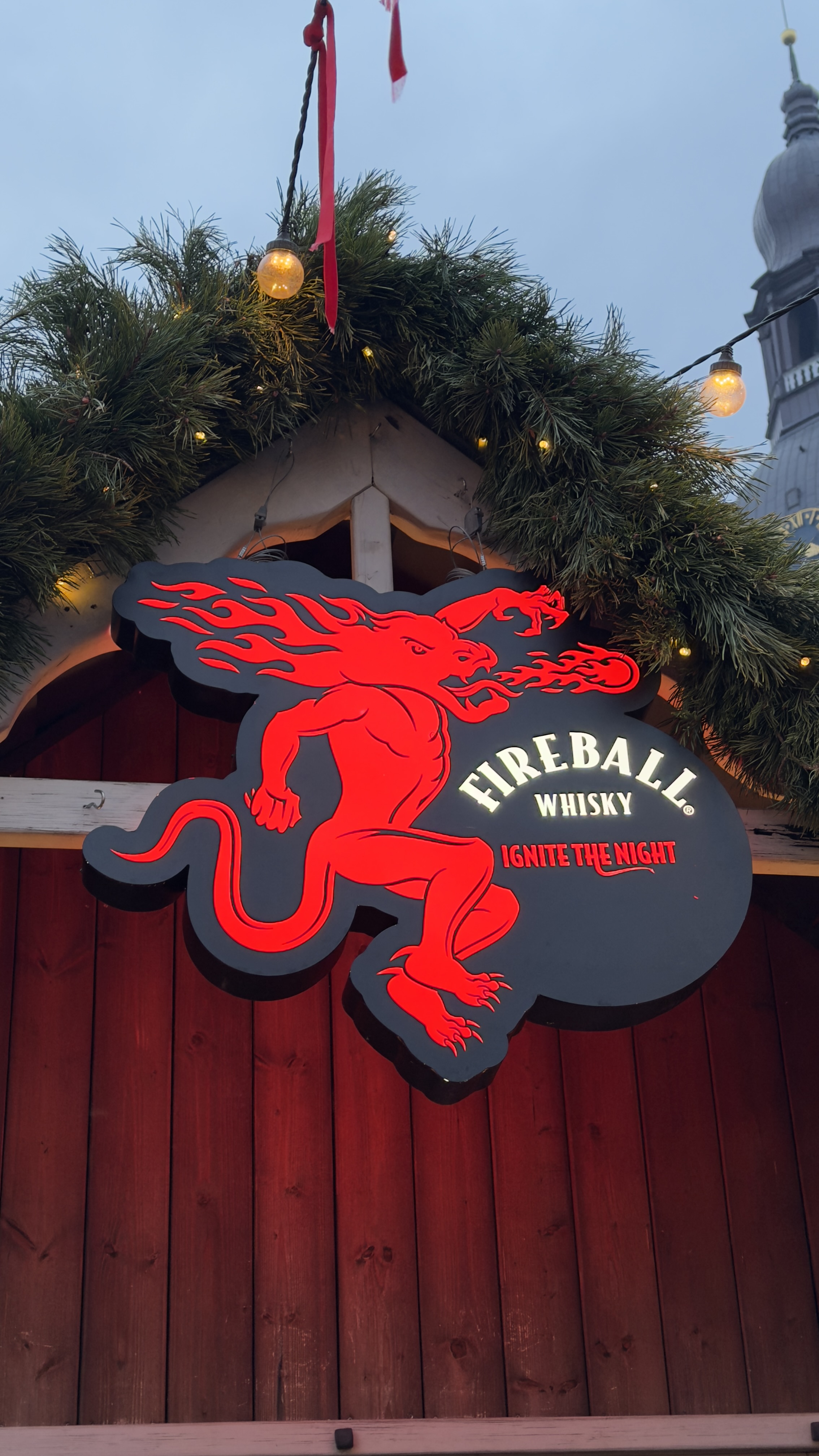 A scenic view of a mountain range with a lake.