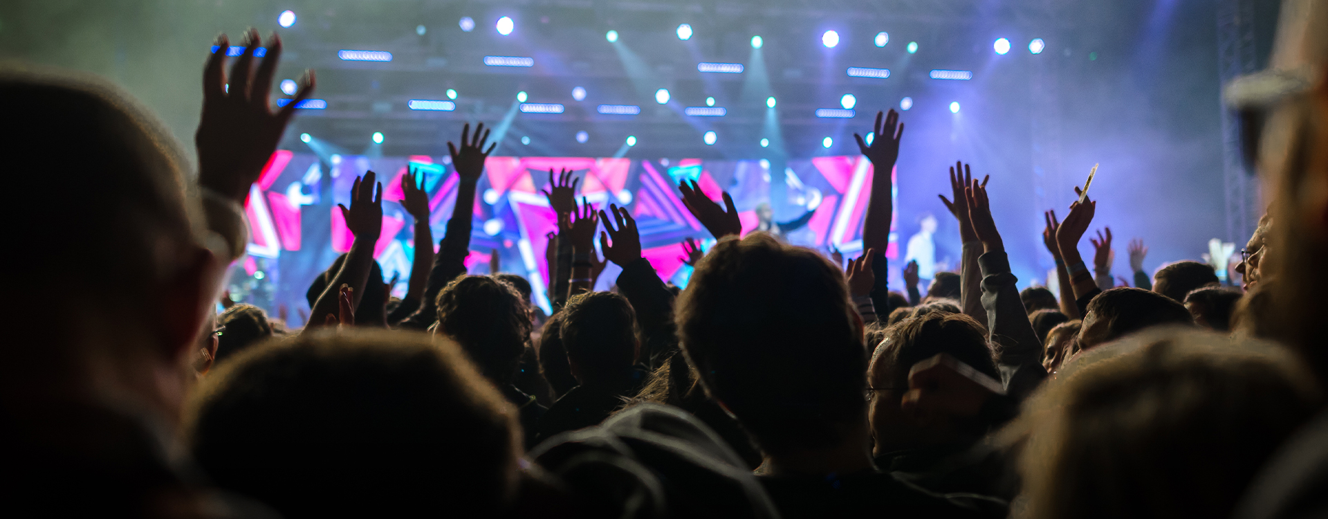 A group of people in a prayer circle.