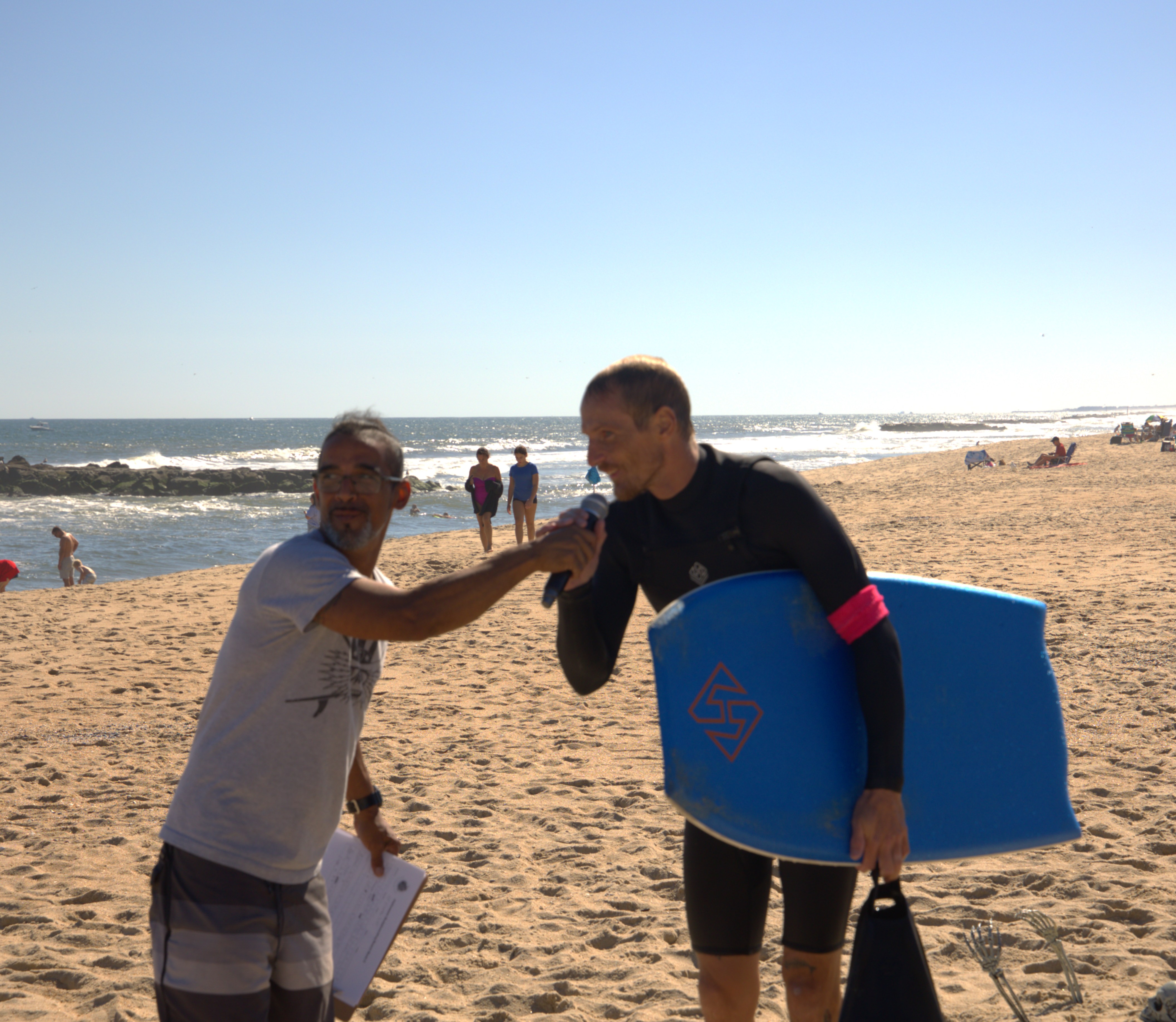 A bodyboarder performing a maneuver on a wave.