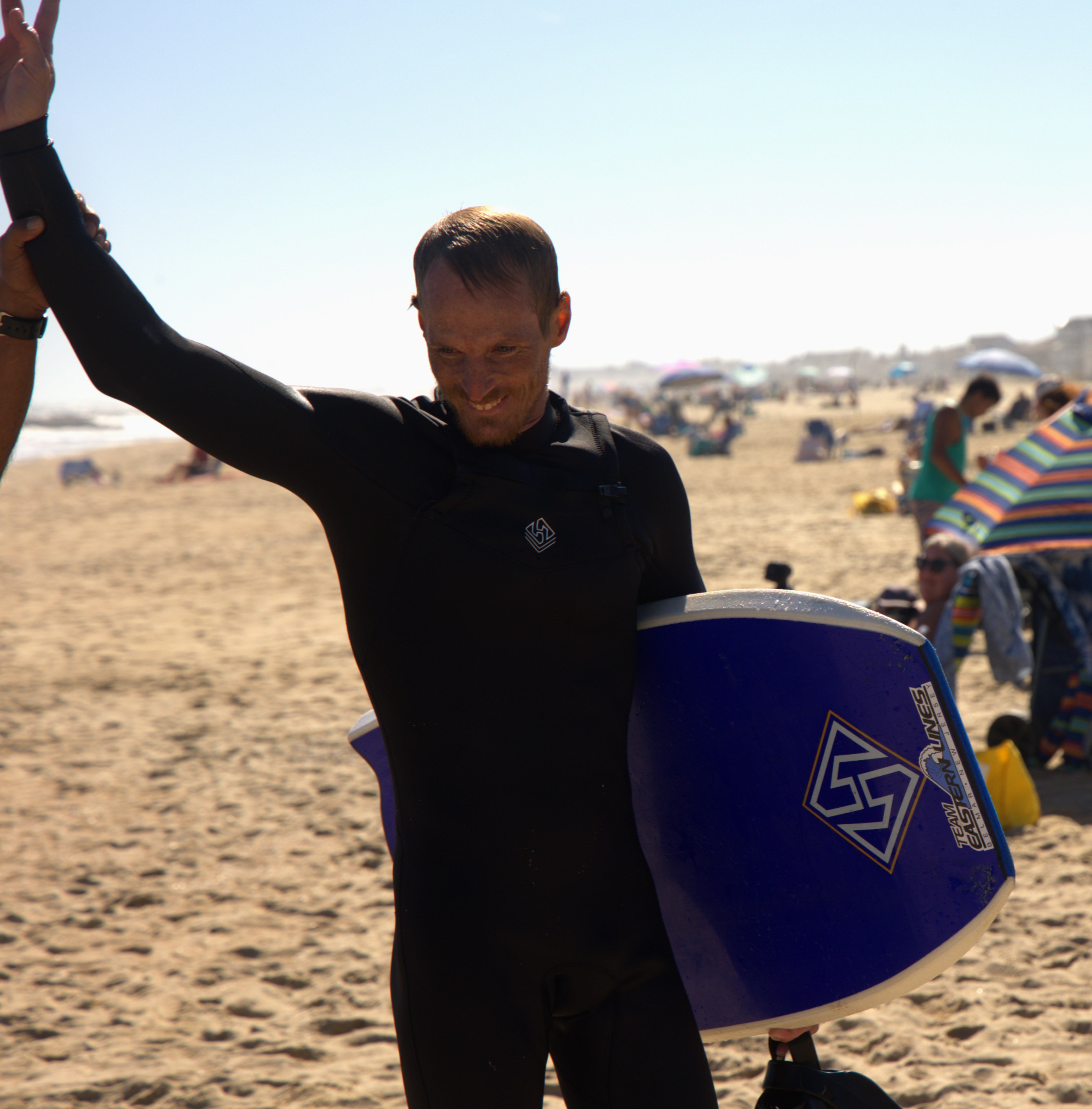A bodyboarder getting air off a wave.