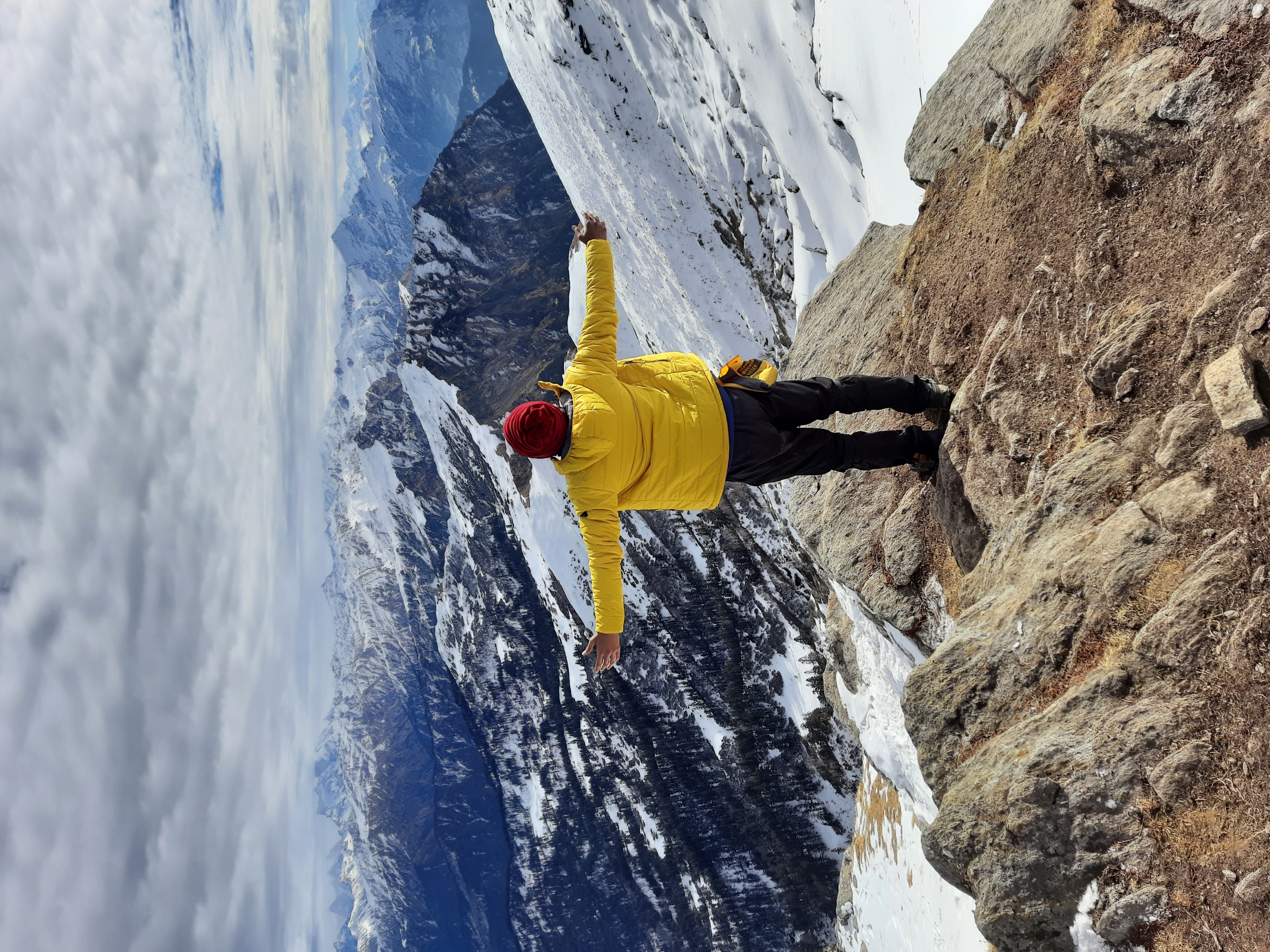 Panoramic view from the summit of Kedarkantha, showing the vast Himalayan landscape.