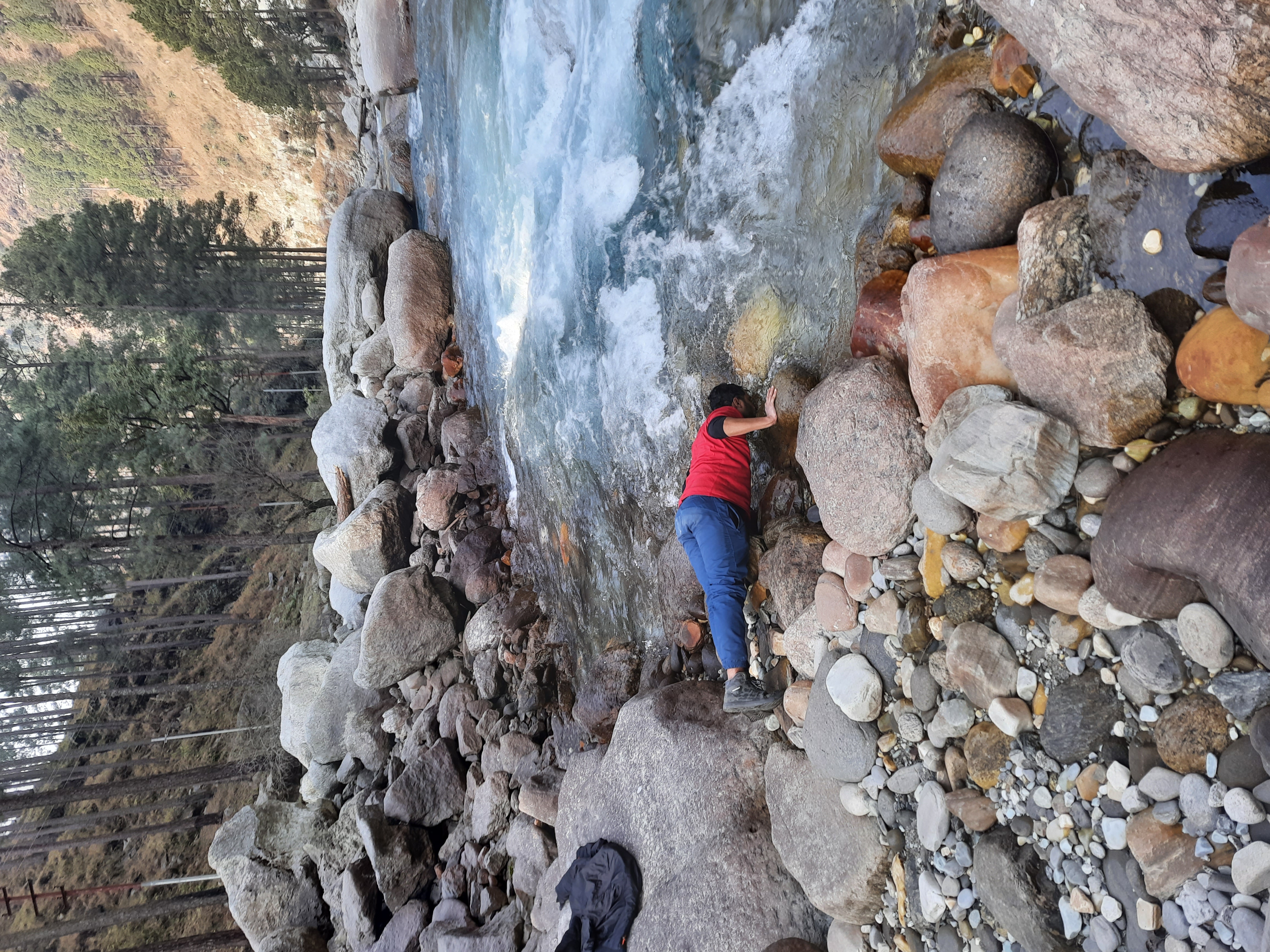 Panoramic view from the summit of Kedarkantha, showing the vast Himalayan landscape.