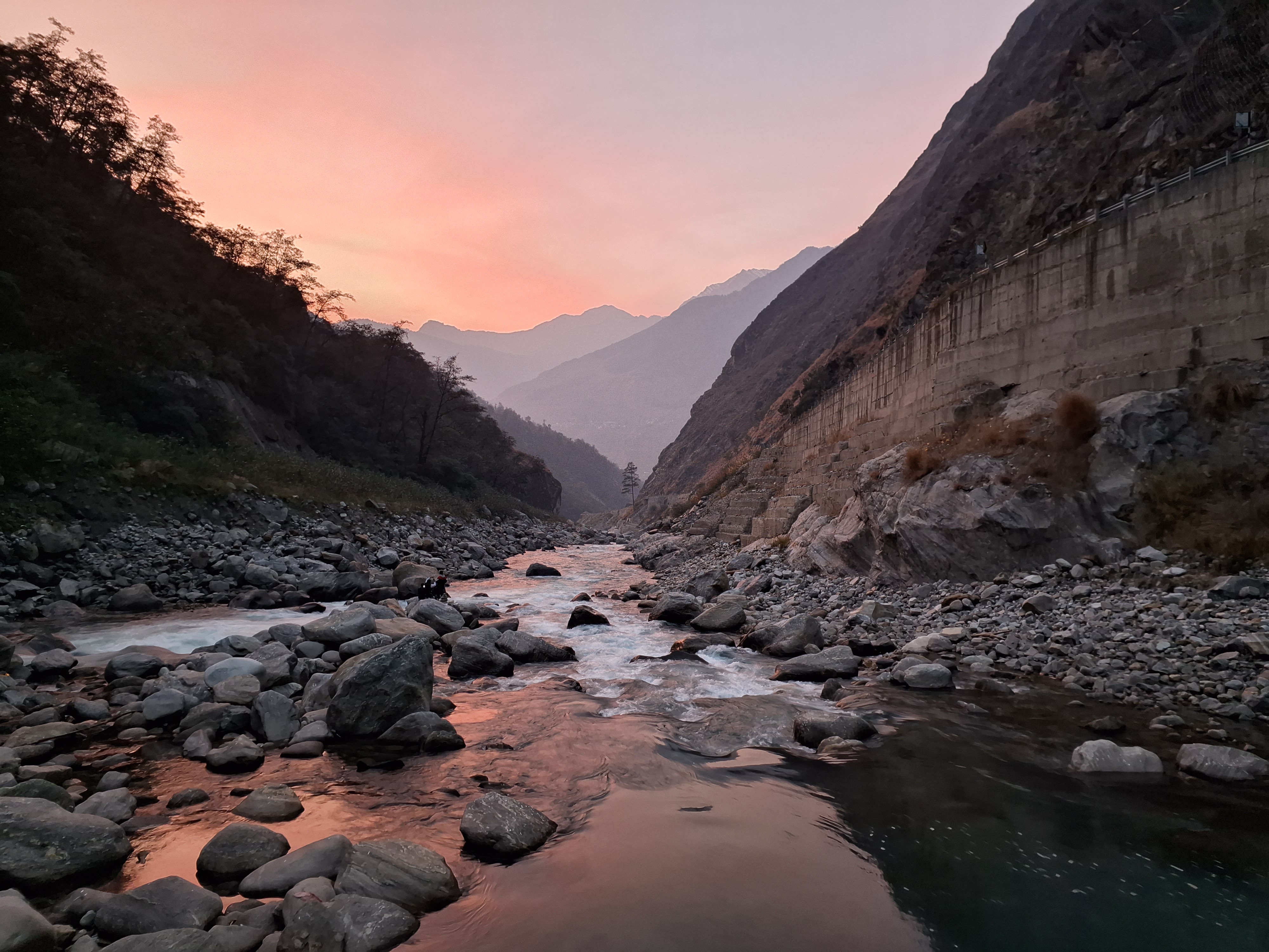 Panoramic view from the summit of kuari pass, showing the vast Himalayan landscape.