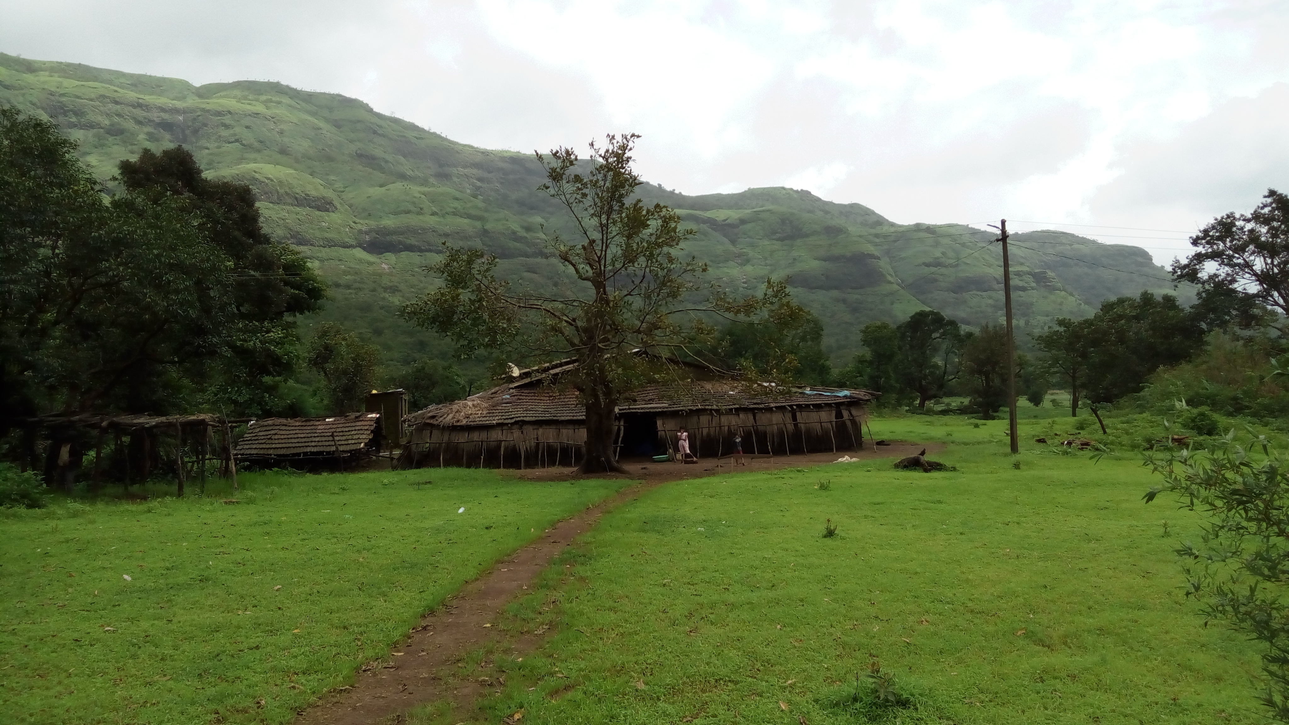 A wide shot of the Andarban mountain range under a clear blue sky.