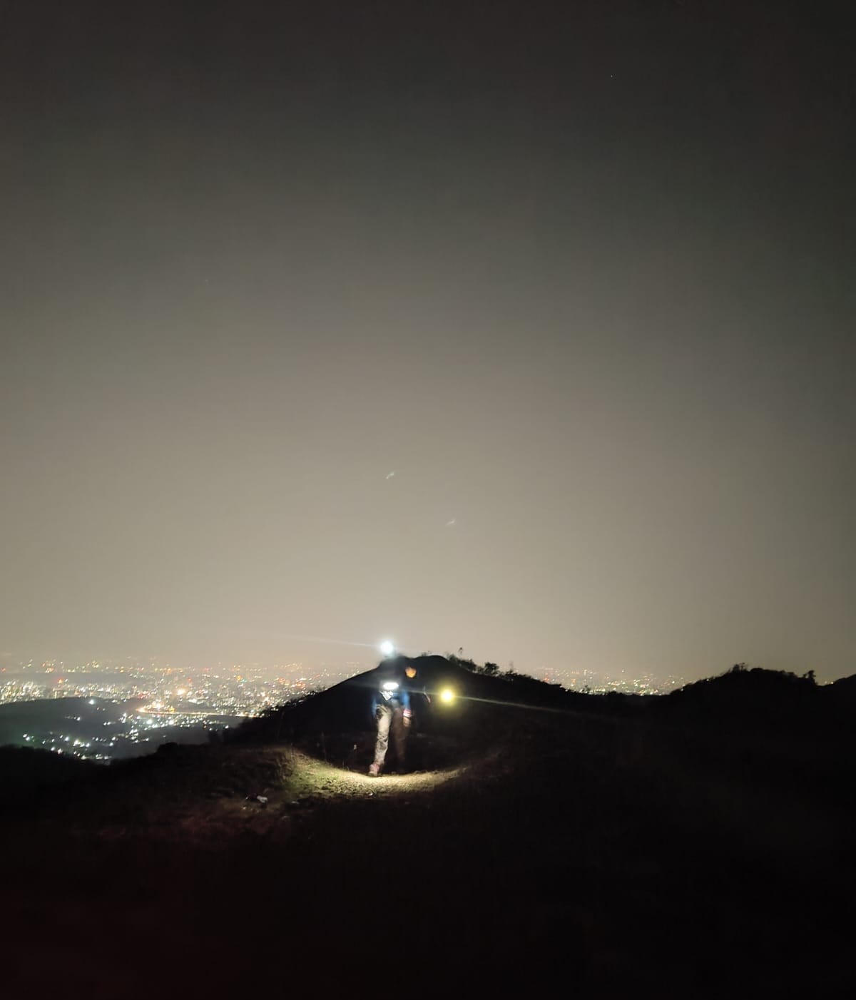 Sunrise view from the final ascent towards Sinhagad fort.