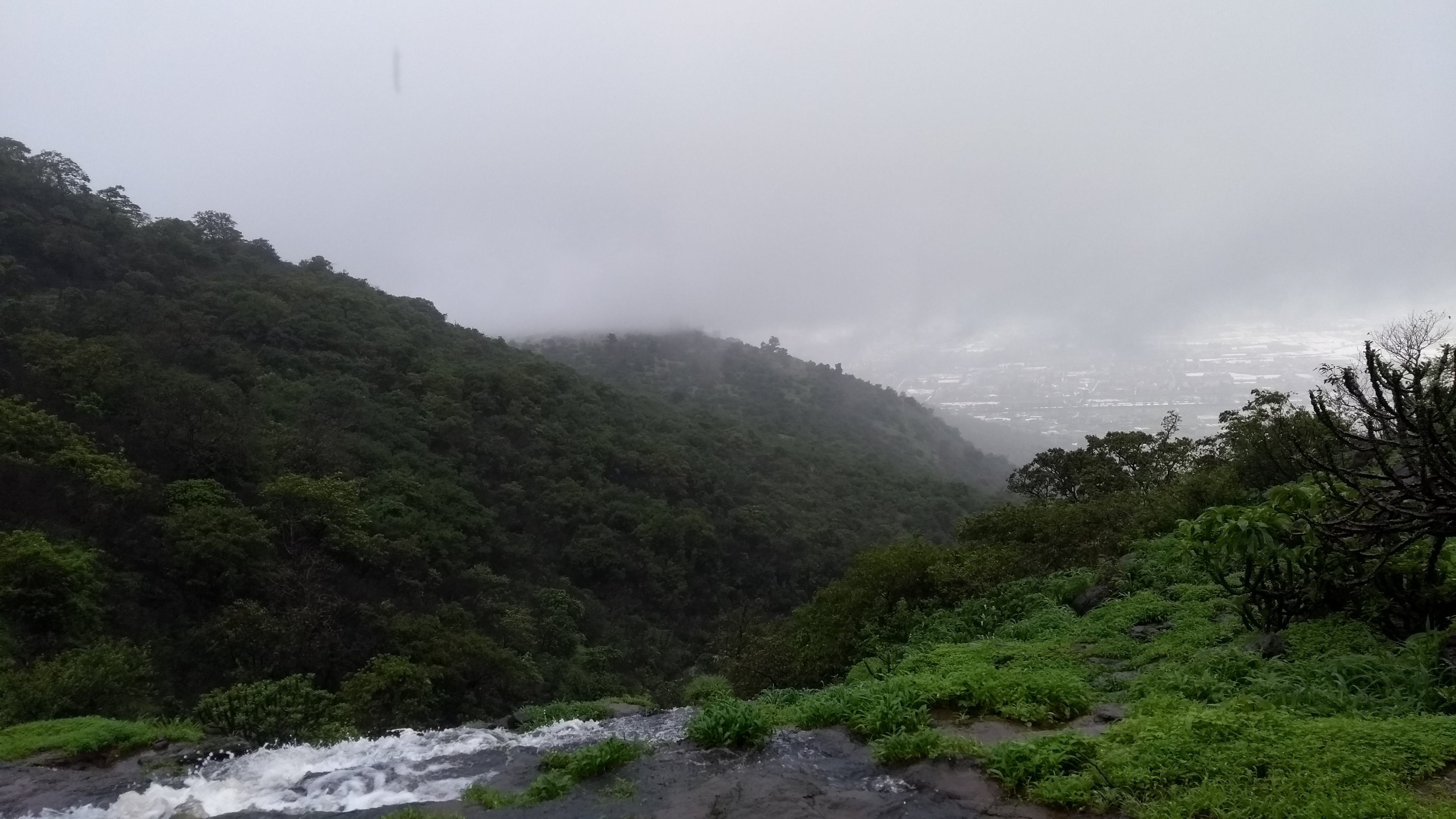 Panoramic view of the surrounding landscape and Lohagad fort from the top of Visapur.