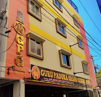 A photo of the residency's entrance, signifying hospitality.