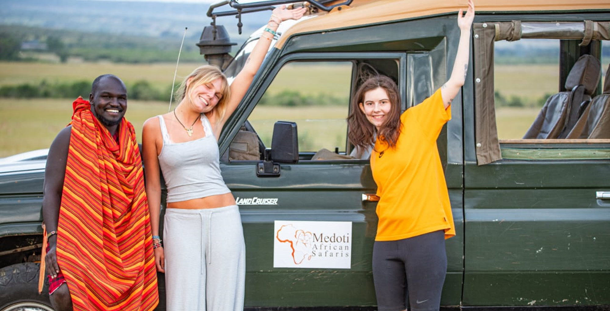 A stunning, clear view of Mount Kilimanjaro with elephants grazing in the foreground.