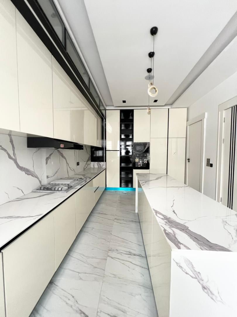 Some houses shout luxury. This one just quietly shows you - image 5