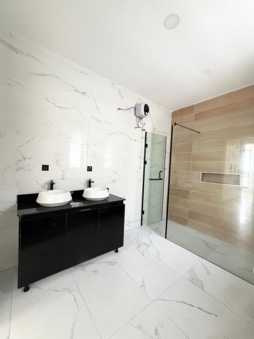 Some houses shout luxury. This one just quietly shows you - image 14