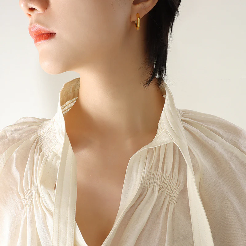 Gyldne Hexia øreringe 18k guldbelagt