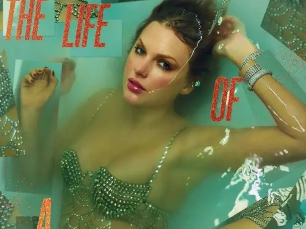 Taylor Swift performing on stage.