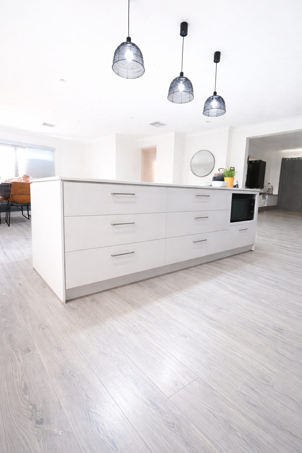 A modern kitchen island bench after a reface in Strathtulloh.