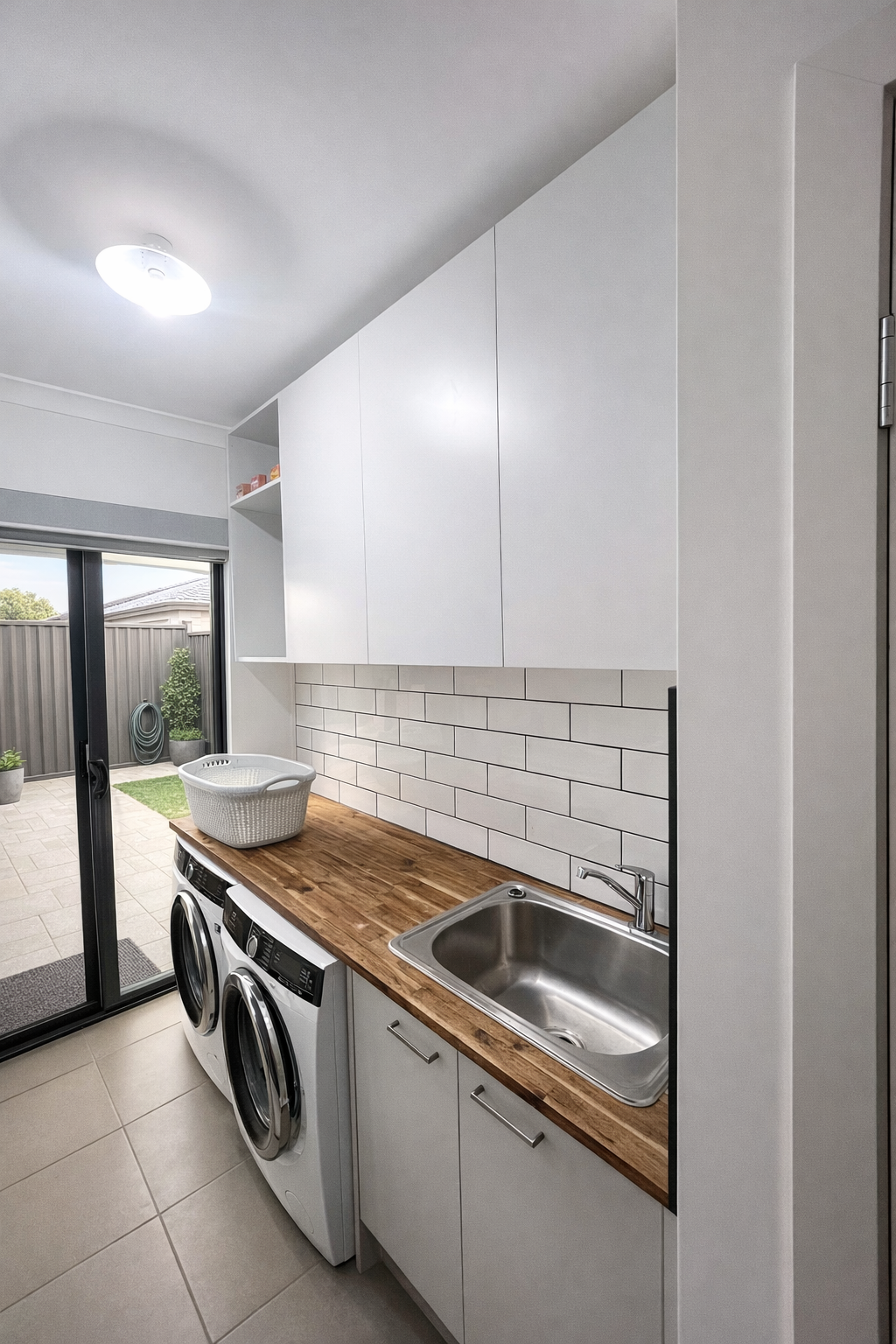 A modern laundry room after a project in Strathtulloh.