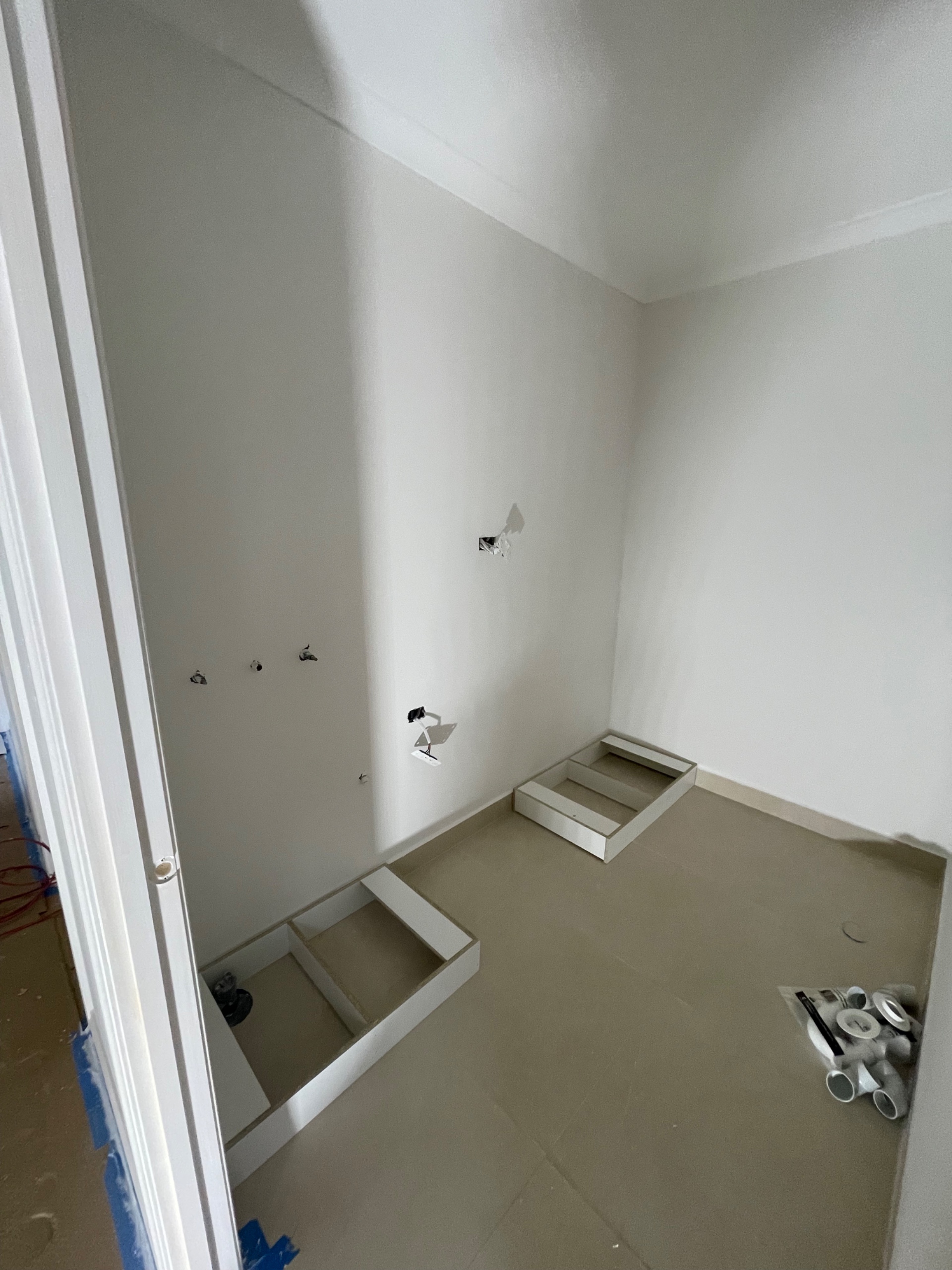 Laundry room before new installation in Avondale Heights.