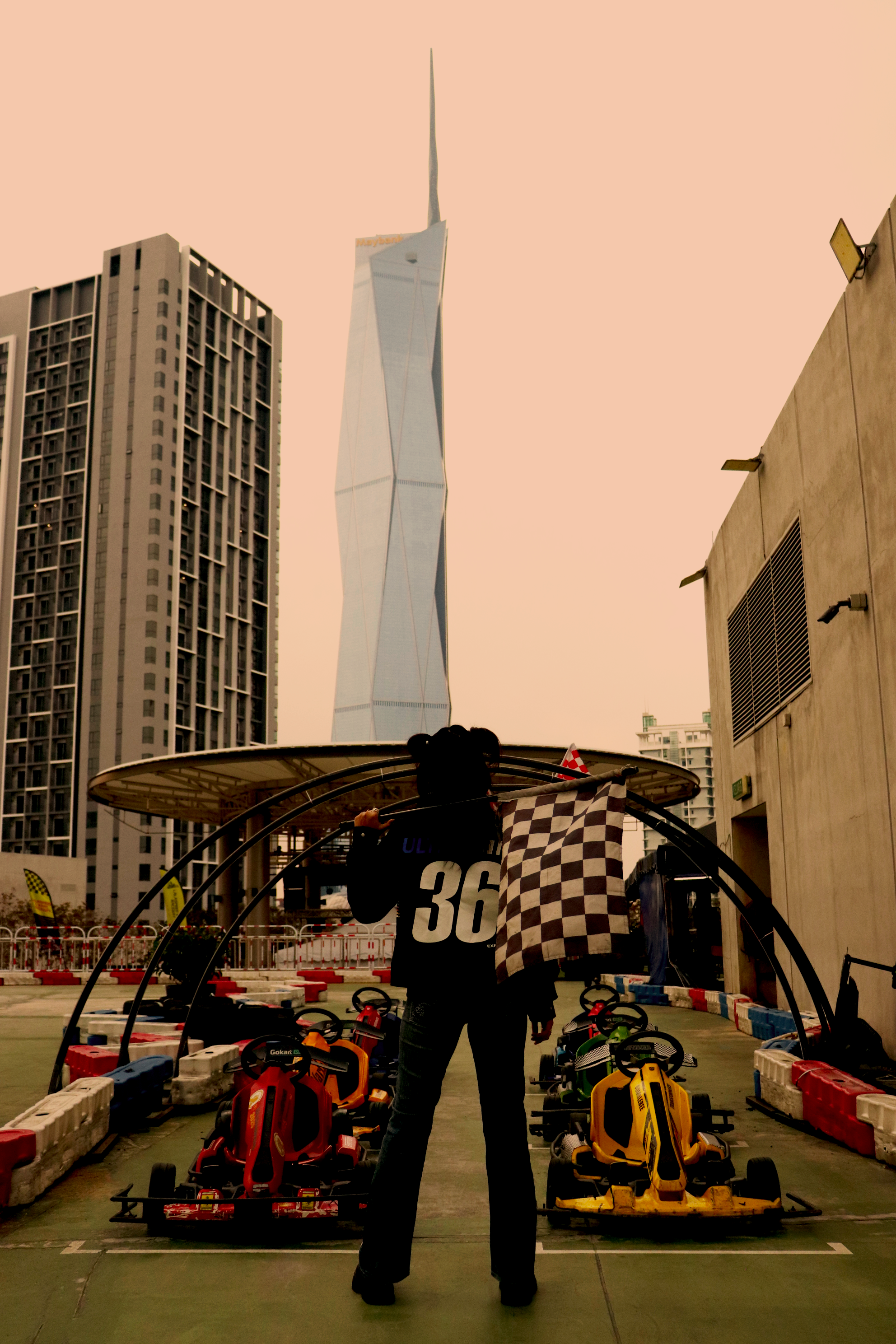 Go-karts racing under the bright sun.