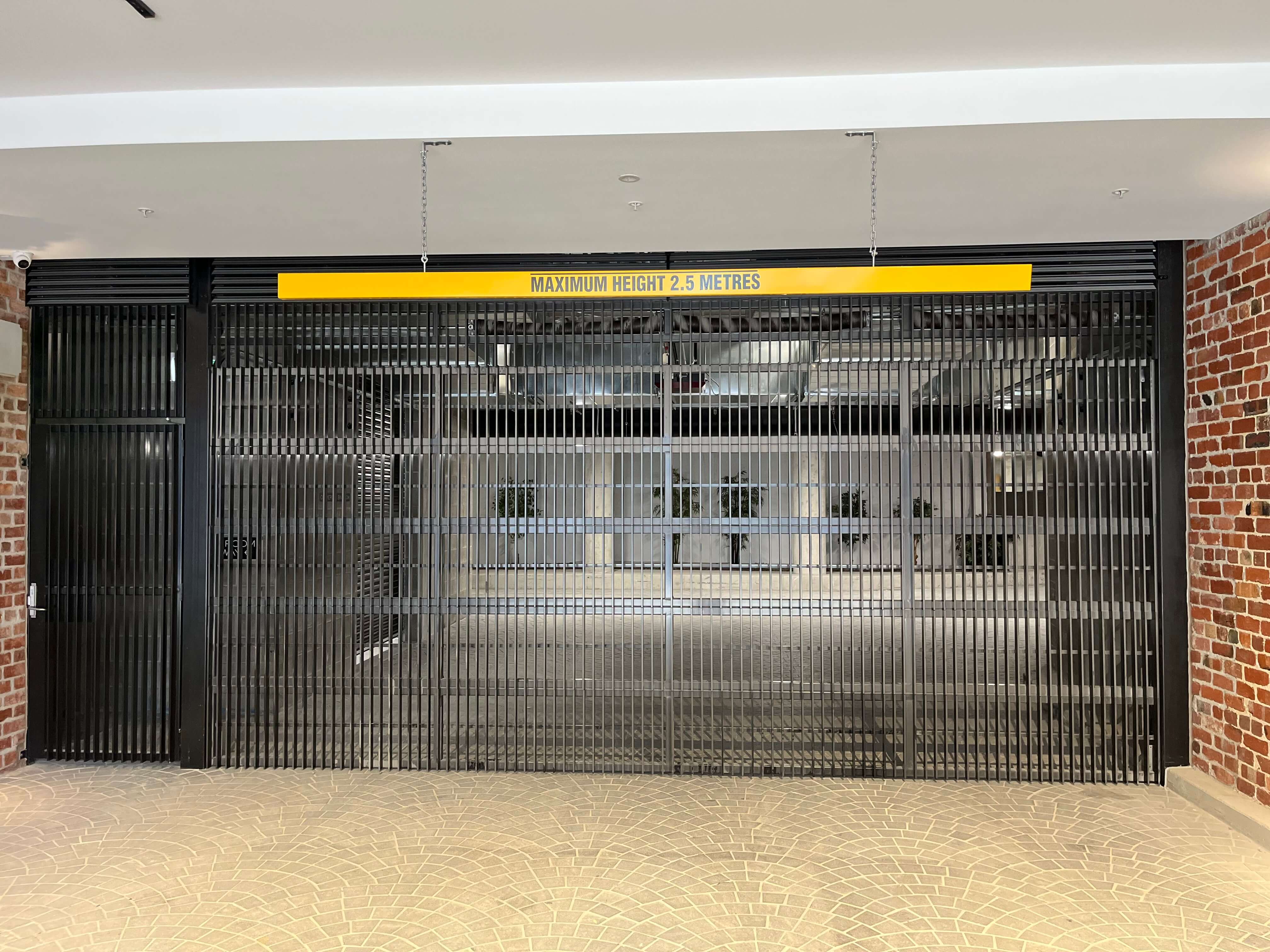 Bar Grille with Fins and Pedestrian Gate.