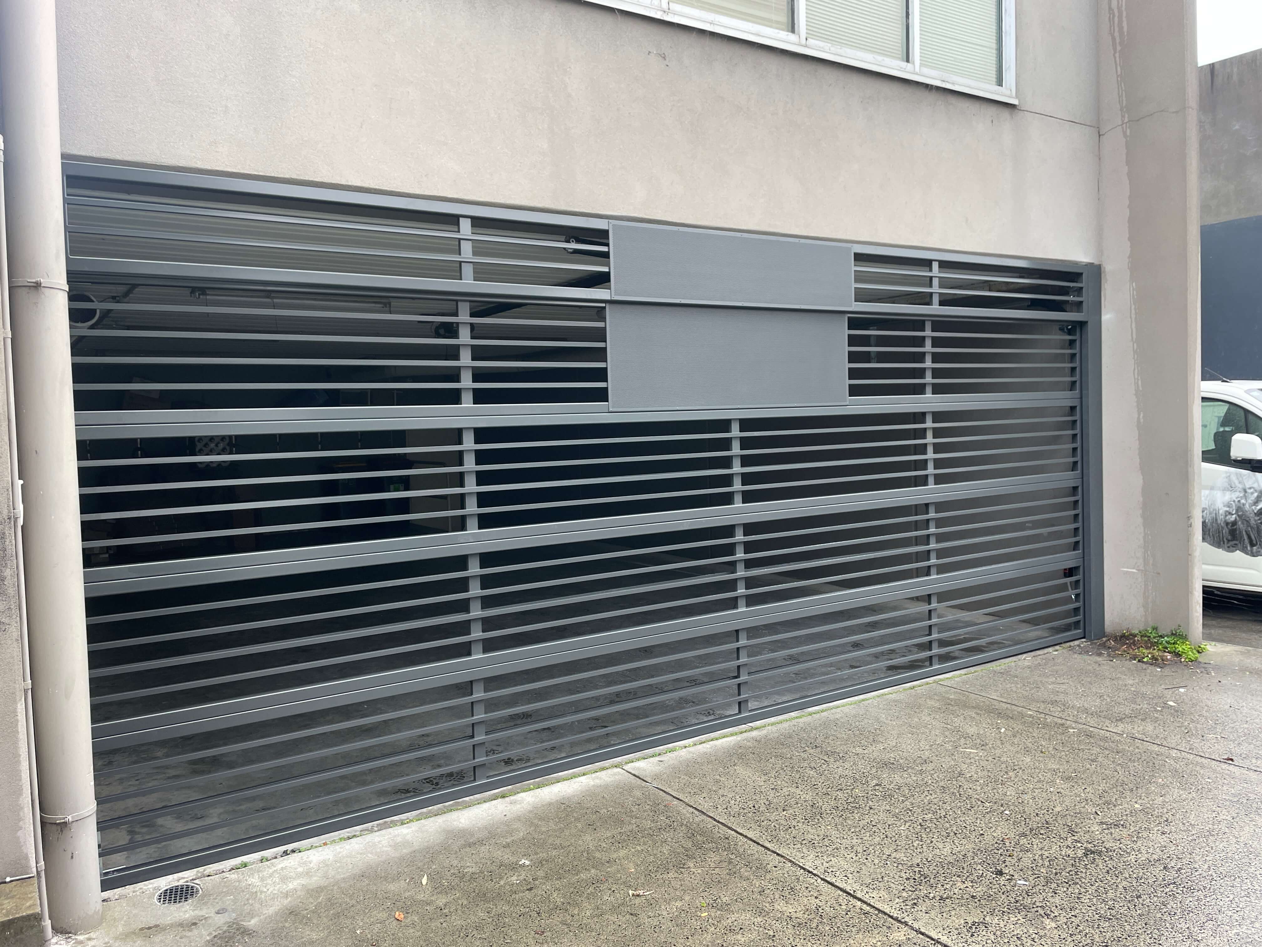 Monument Horizontal Bar Grille with Solid Panels.