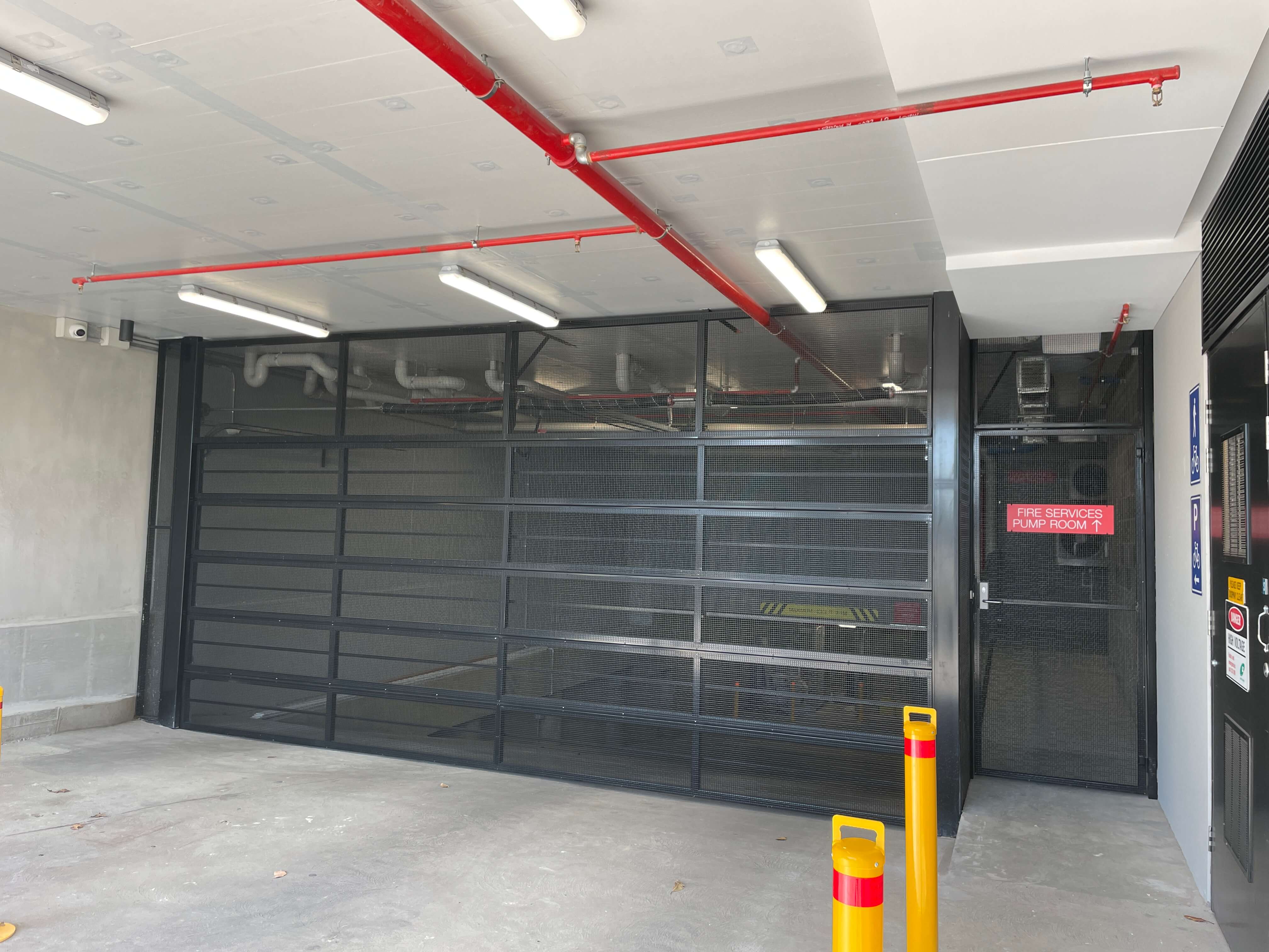 Black Mesh Bar Grille with Infill and Pedestrian Gate.