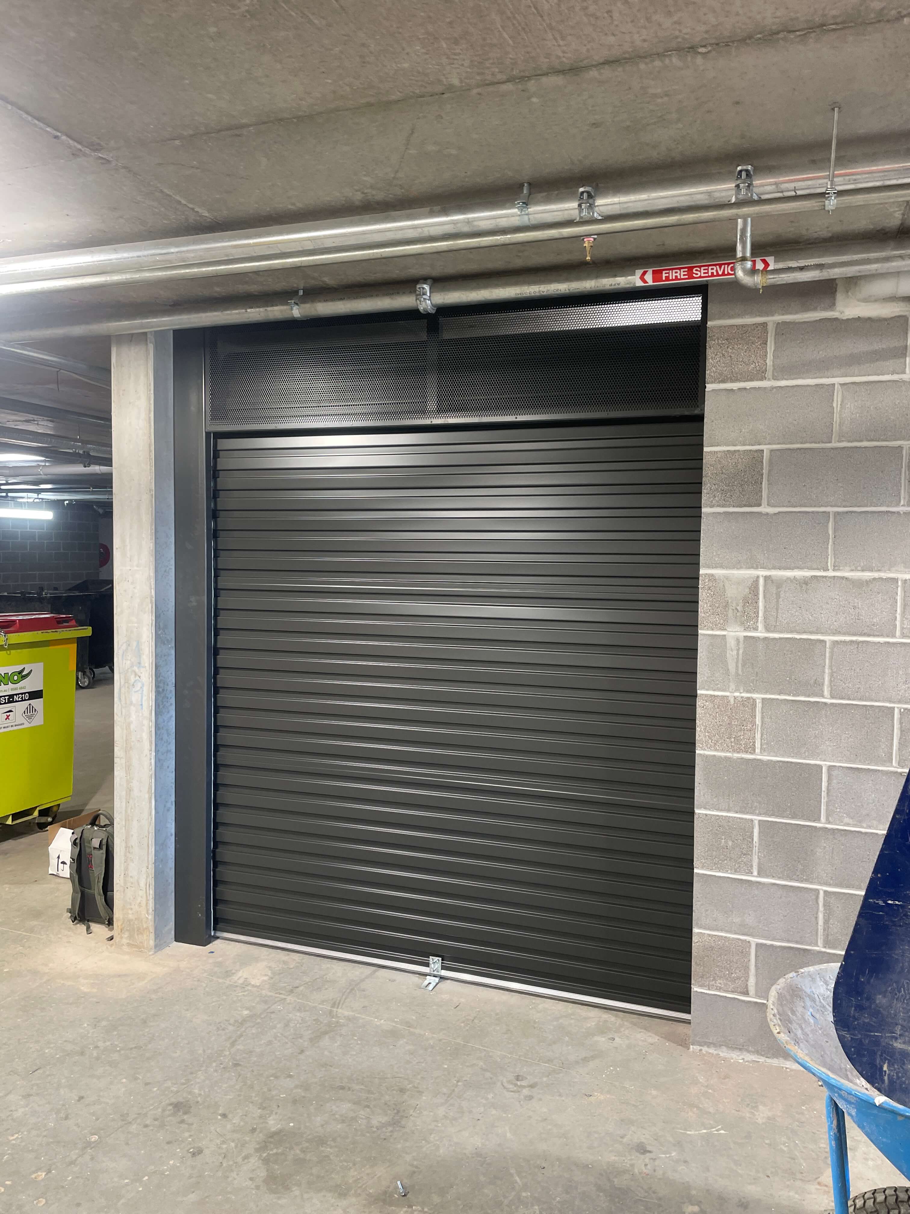 Roller door for Bin Room with Fascia alternate.