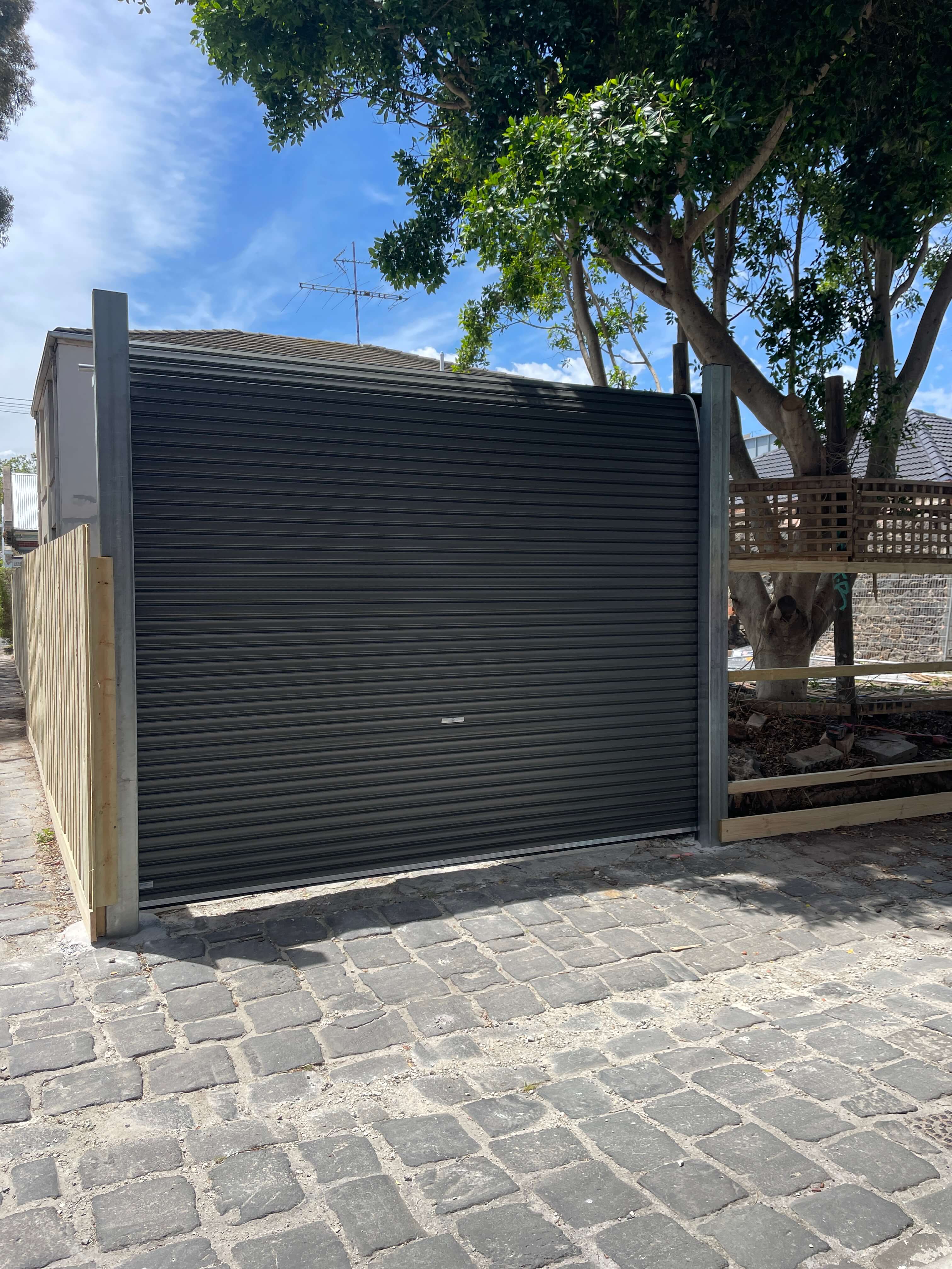 Freestanding Woodland Gray Roller Door.