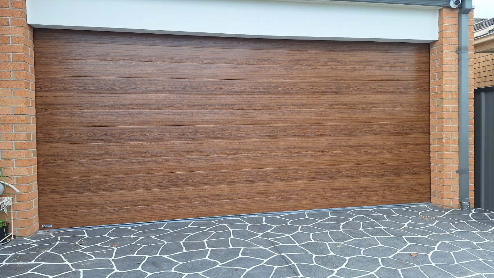 Ashwood Tuscan Sectional Door.