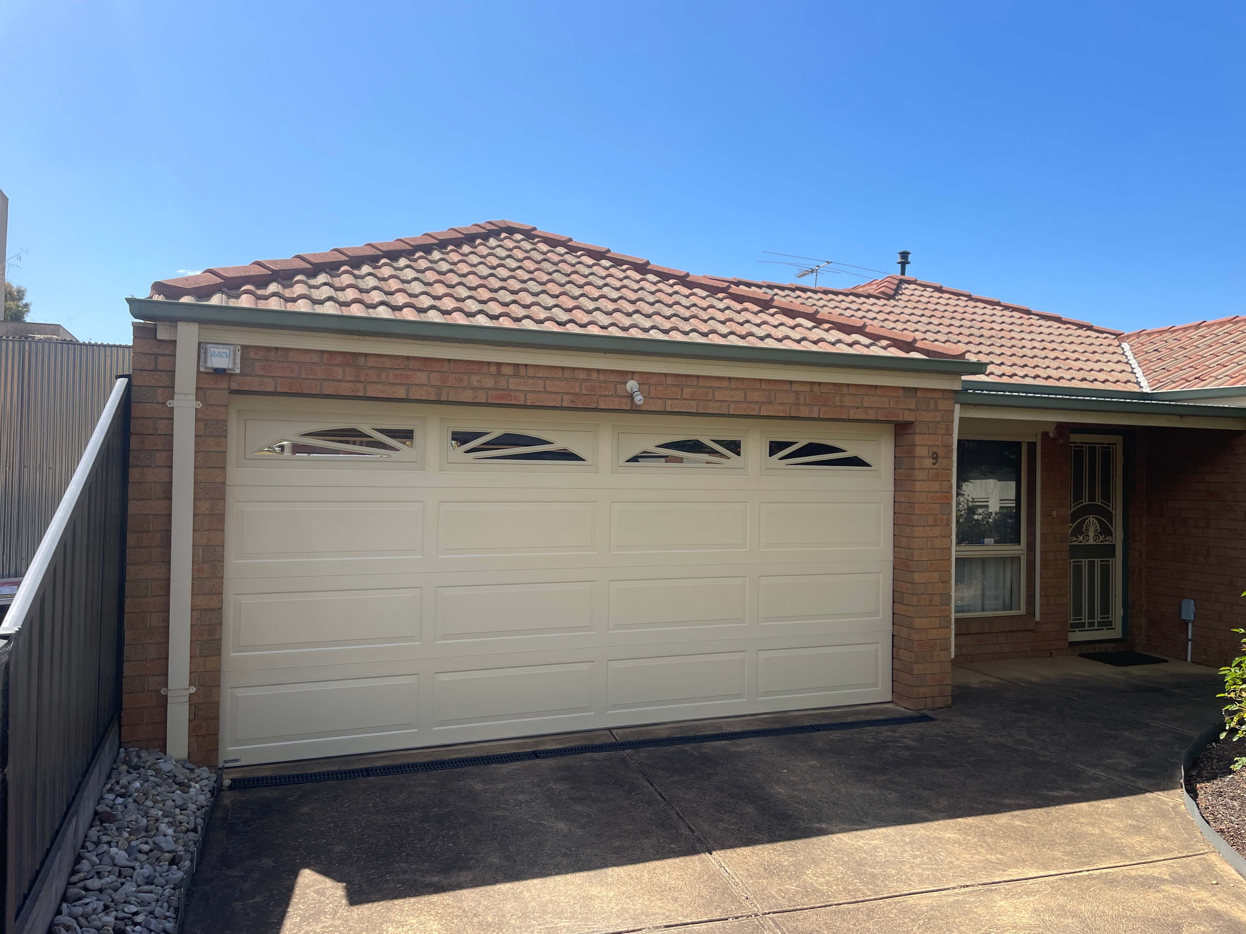 Hampton Classic Cream Sectional Door with Windows.