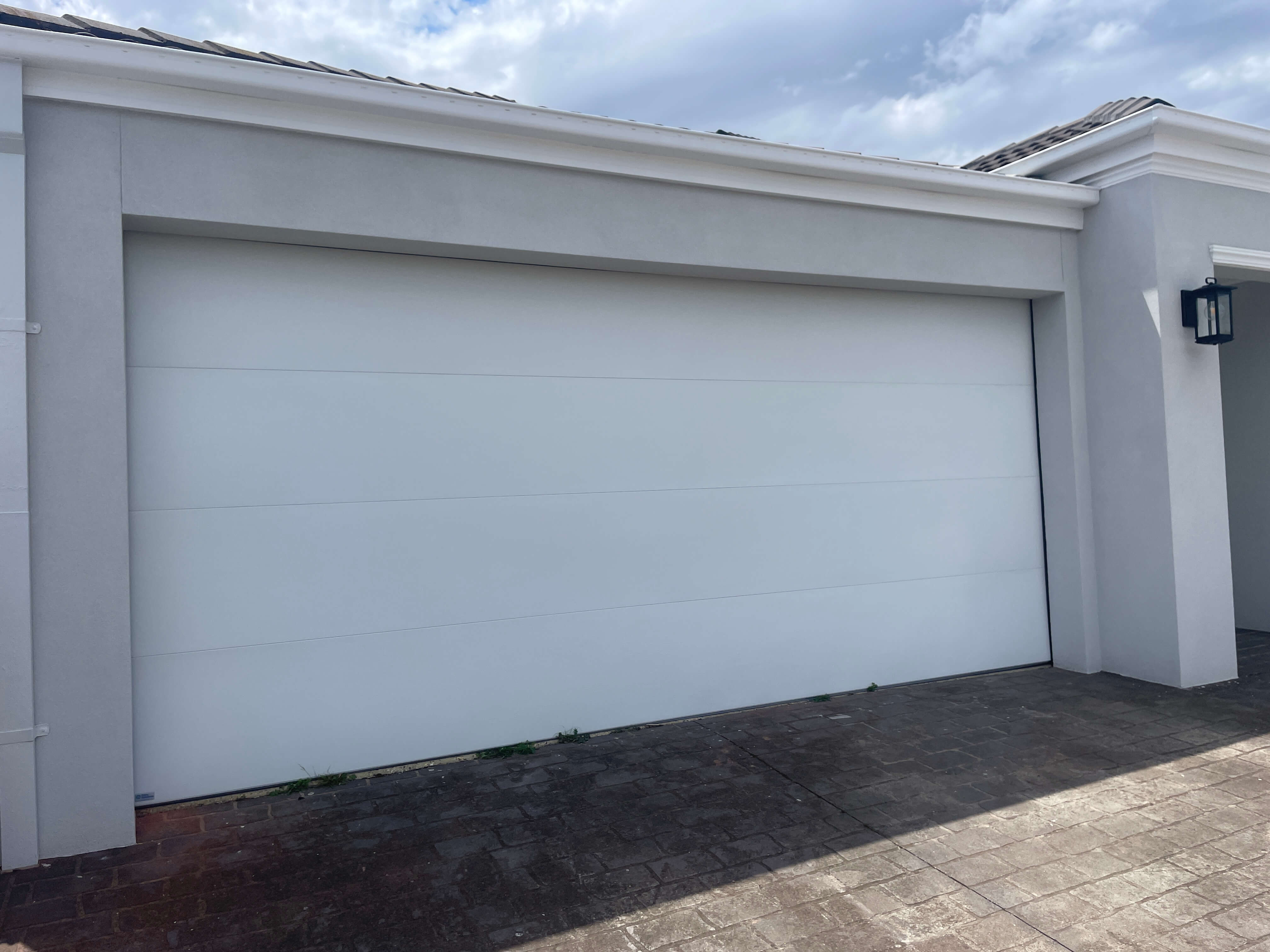 Madison Dover White Sectional Door.