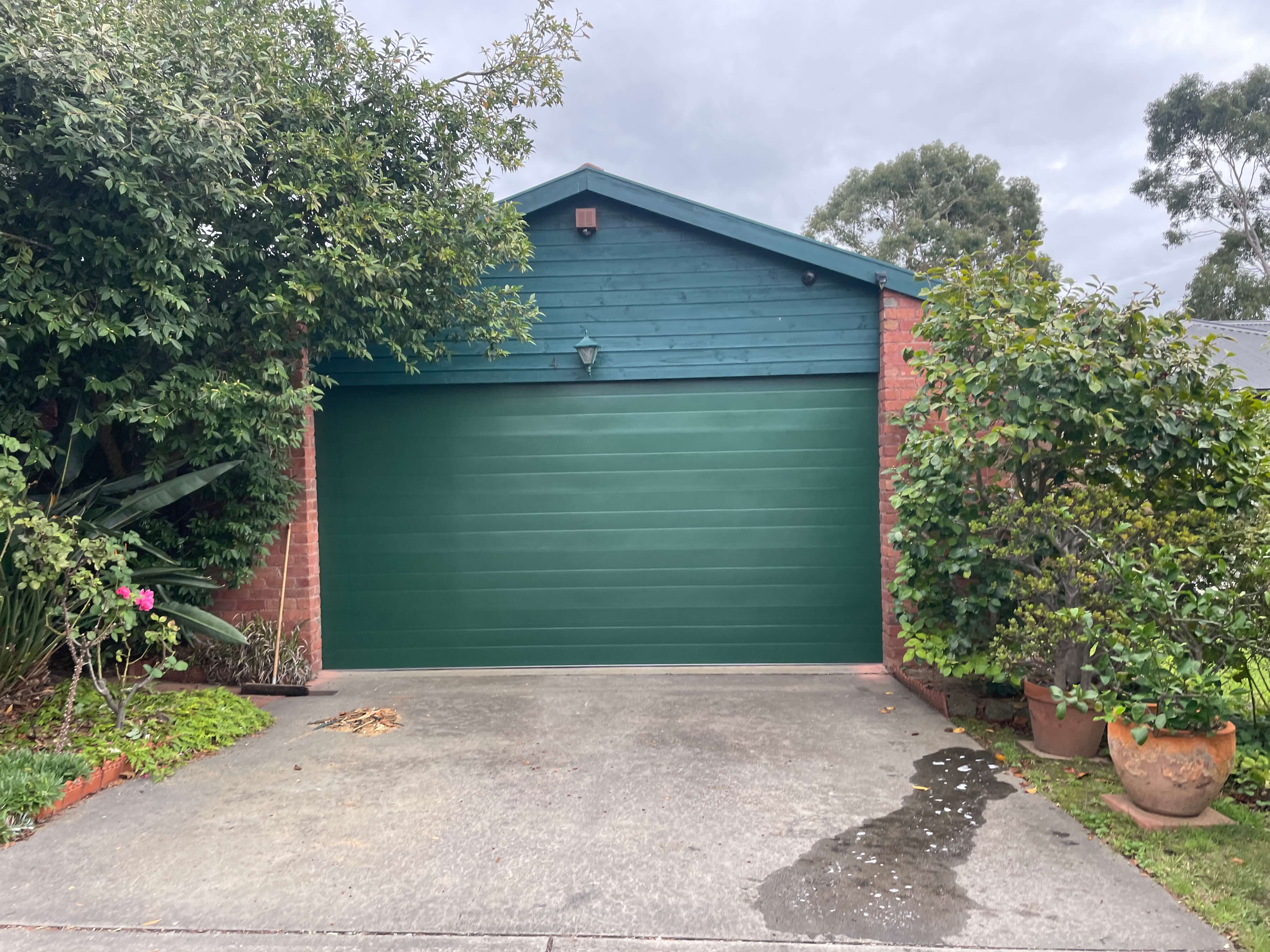 Cottage Green Sectional Door.