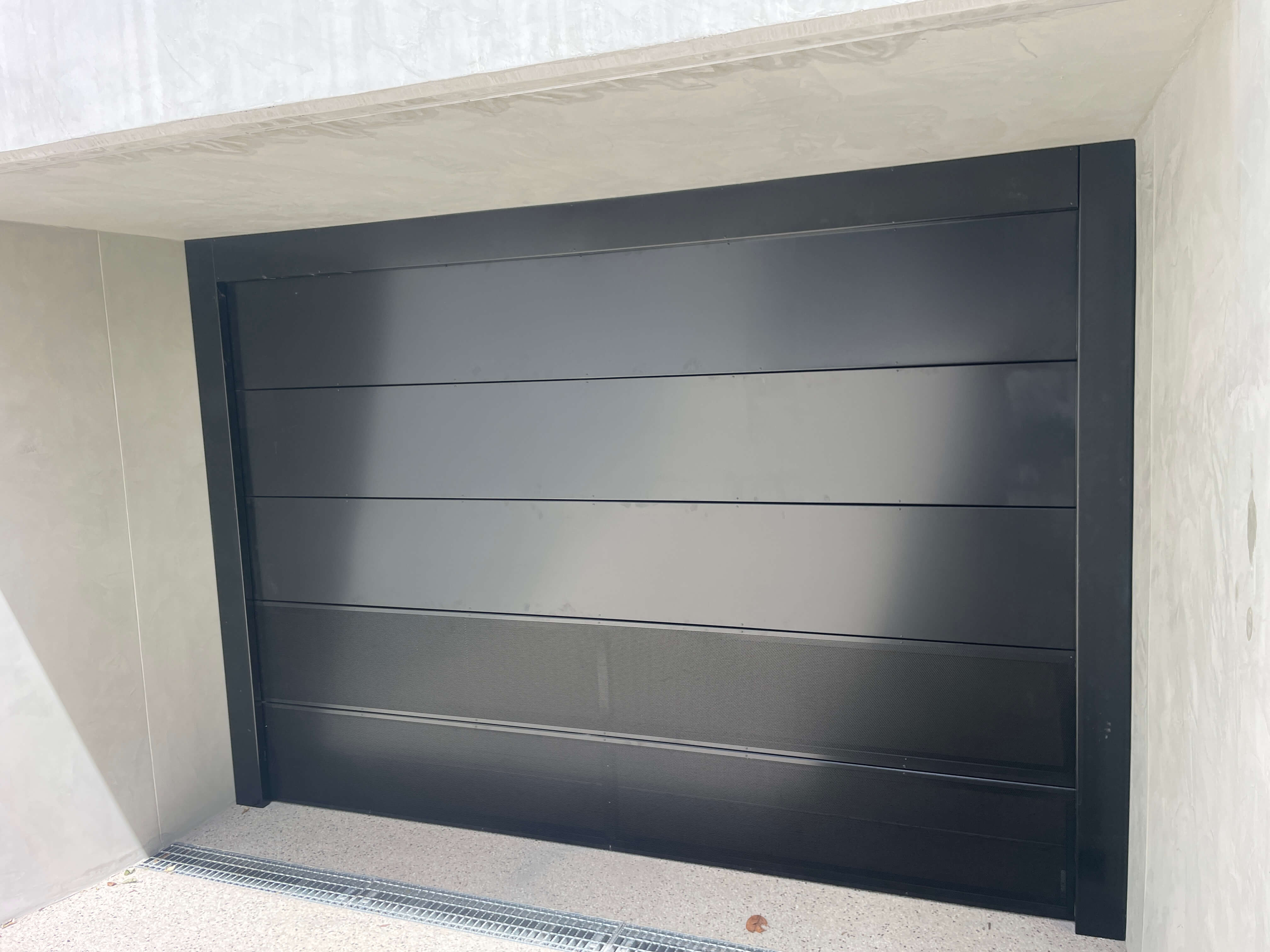 Night Sky Sectional Door with Mesh Bottom.