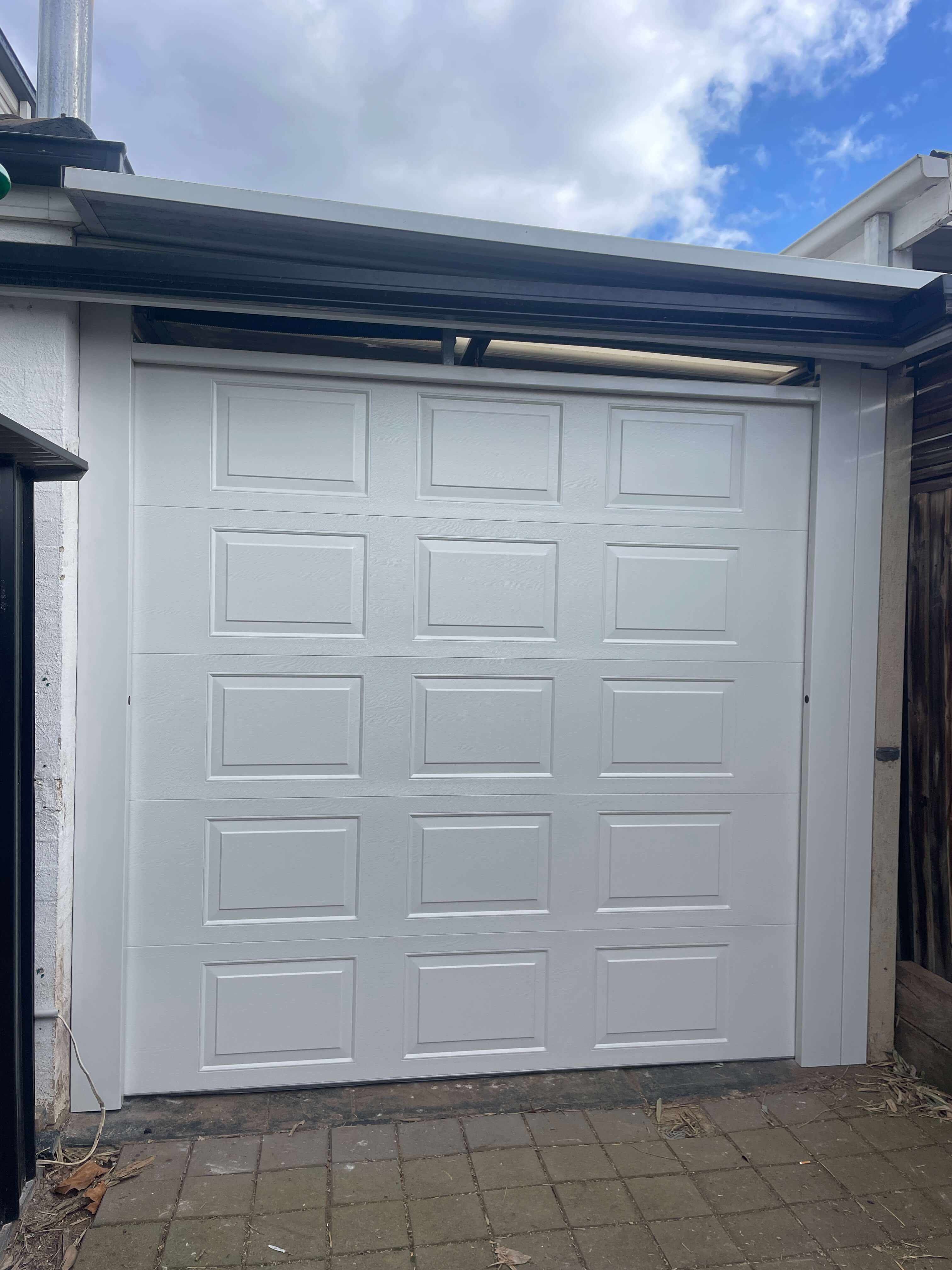 Oxford Surfmist Sectional Door with Infill and LHR.