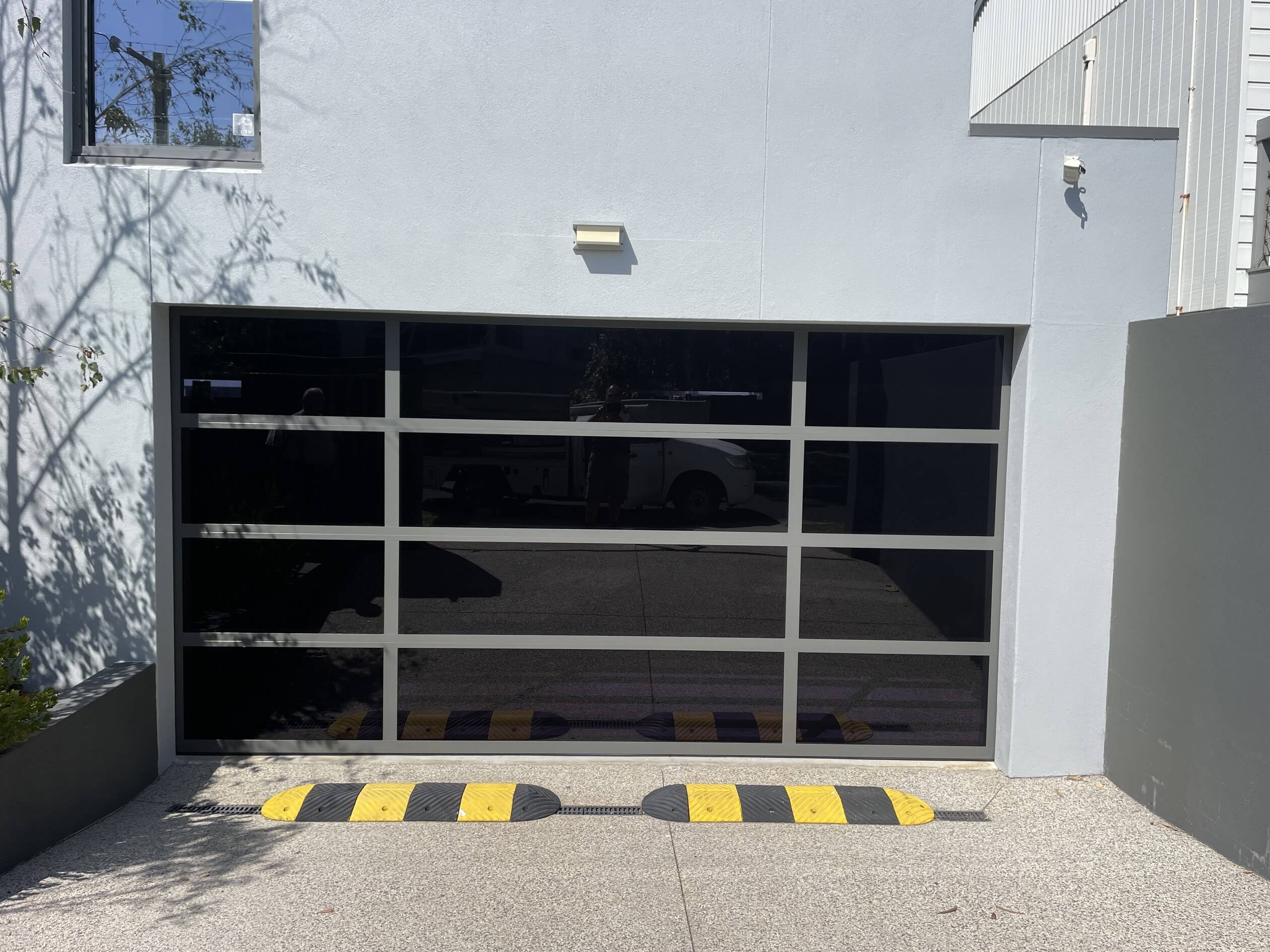 Glass and Perspex Sectional Door.