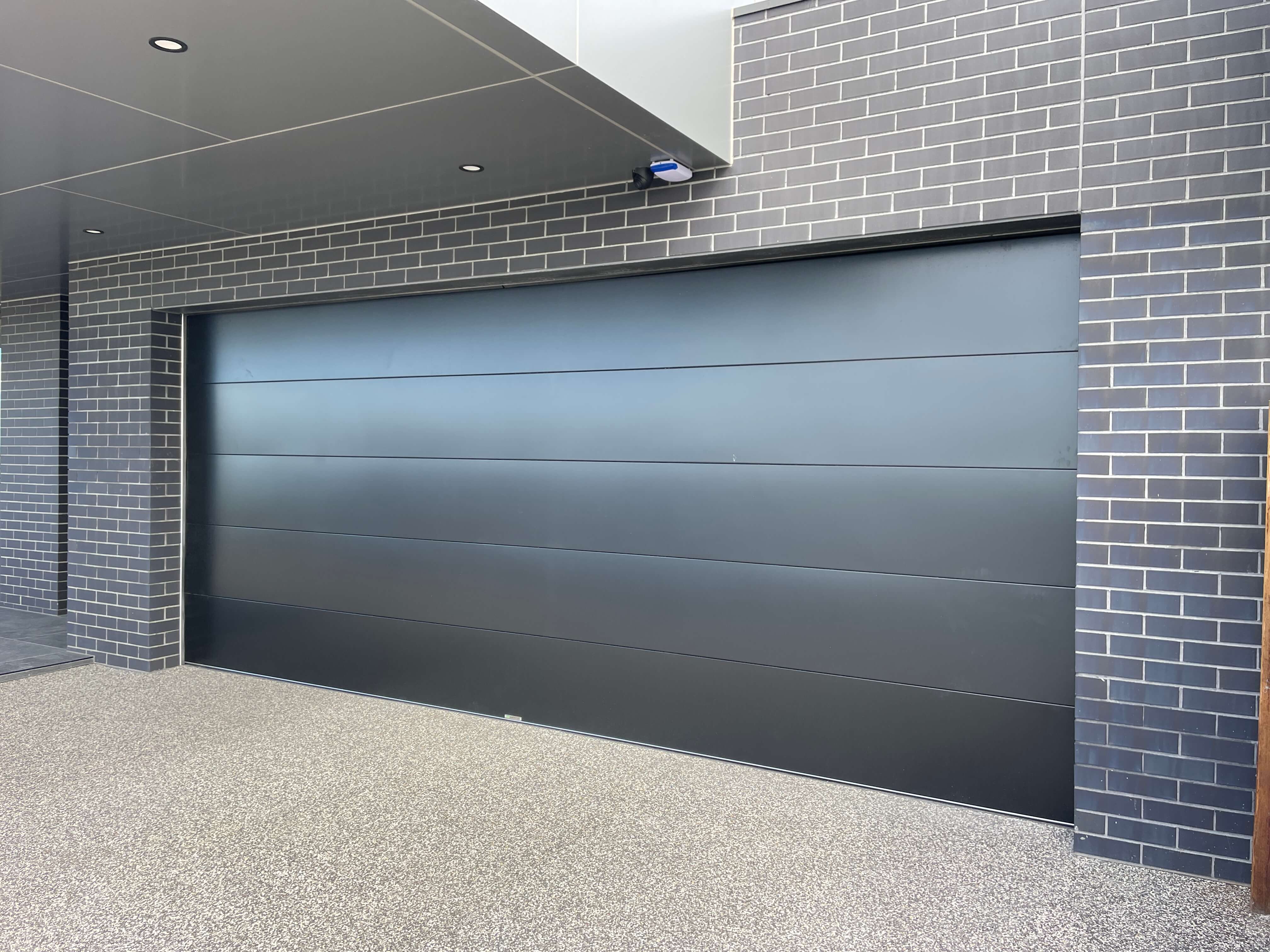 Tranquillo Black Sectional Door.