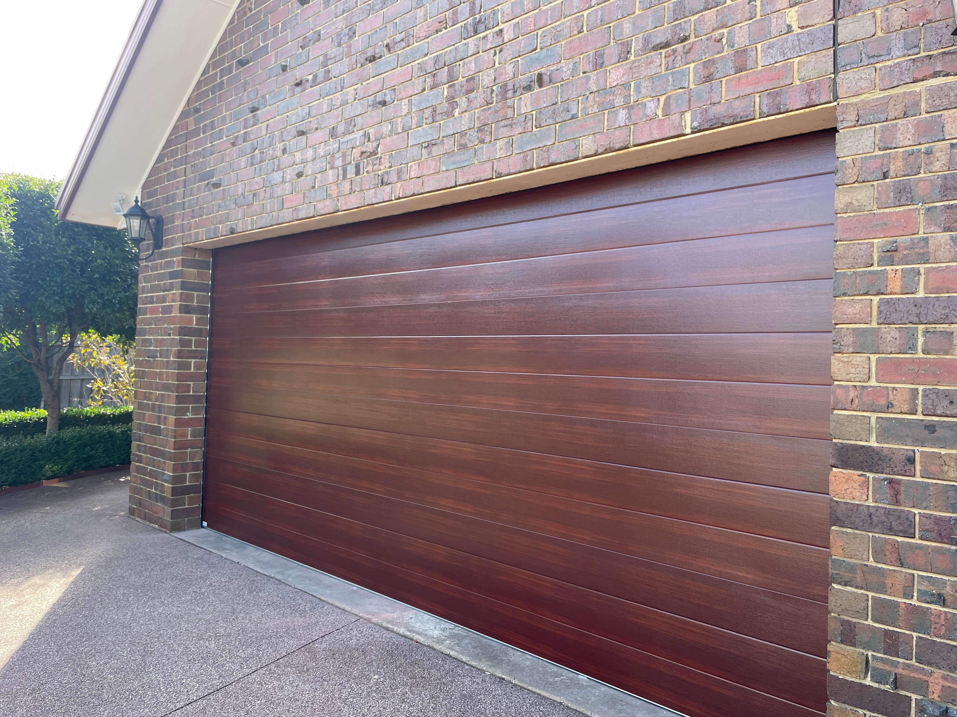 Tuscan Caoba Sectional Door.