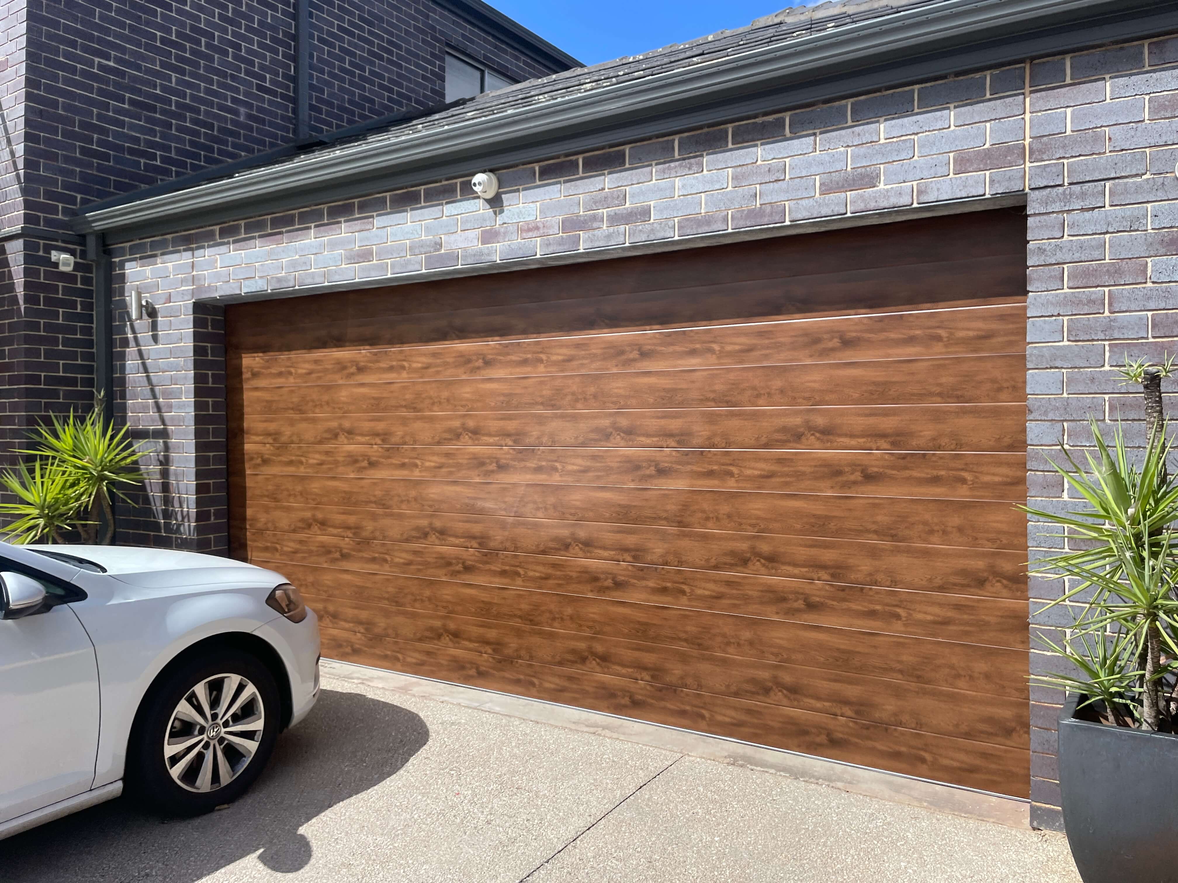 Tuscan Dark Oak Sectional Door.