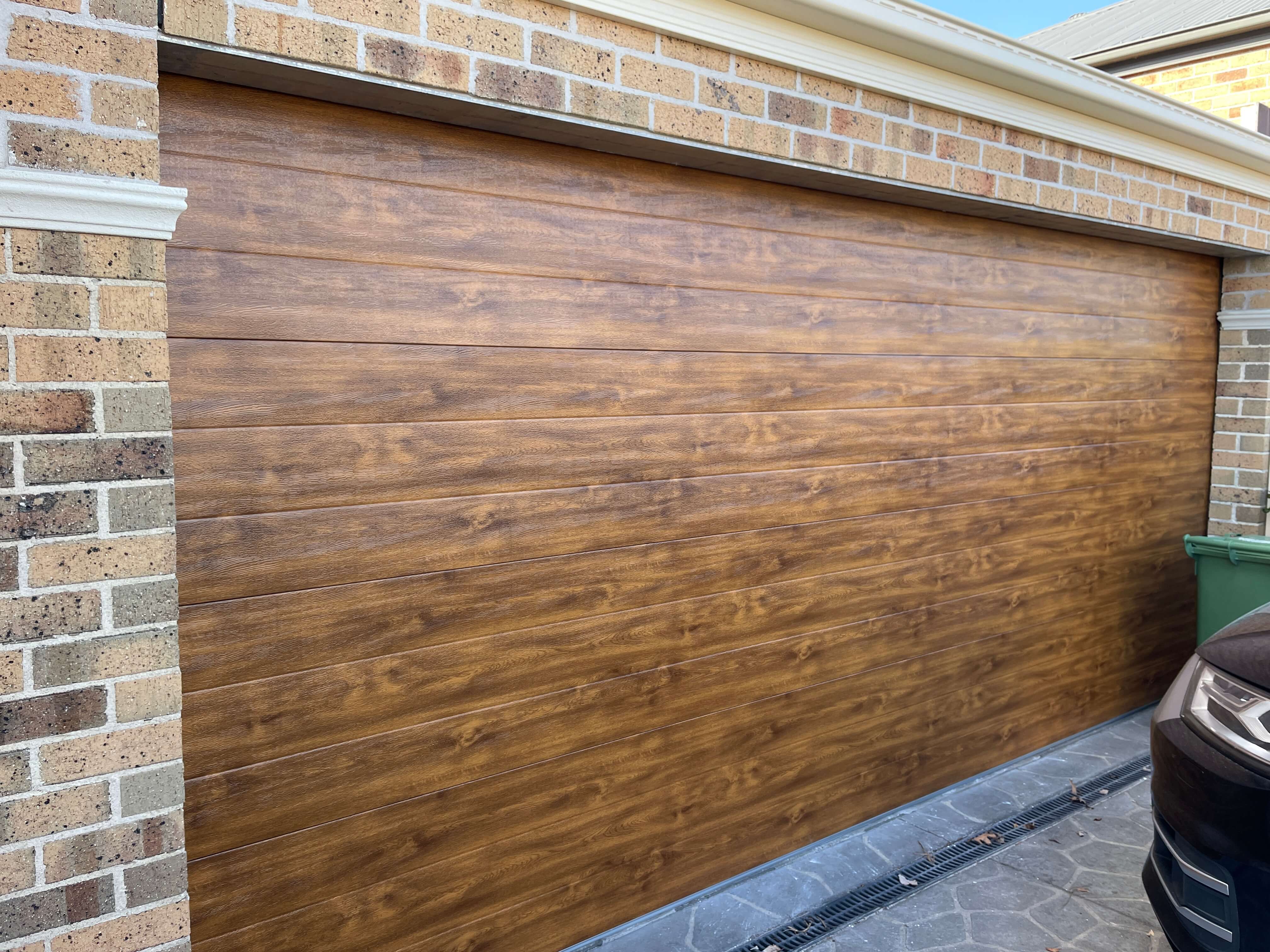 Tuscan Golden Oak Sectional Door.