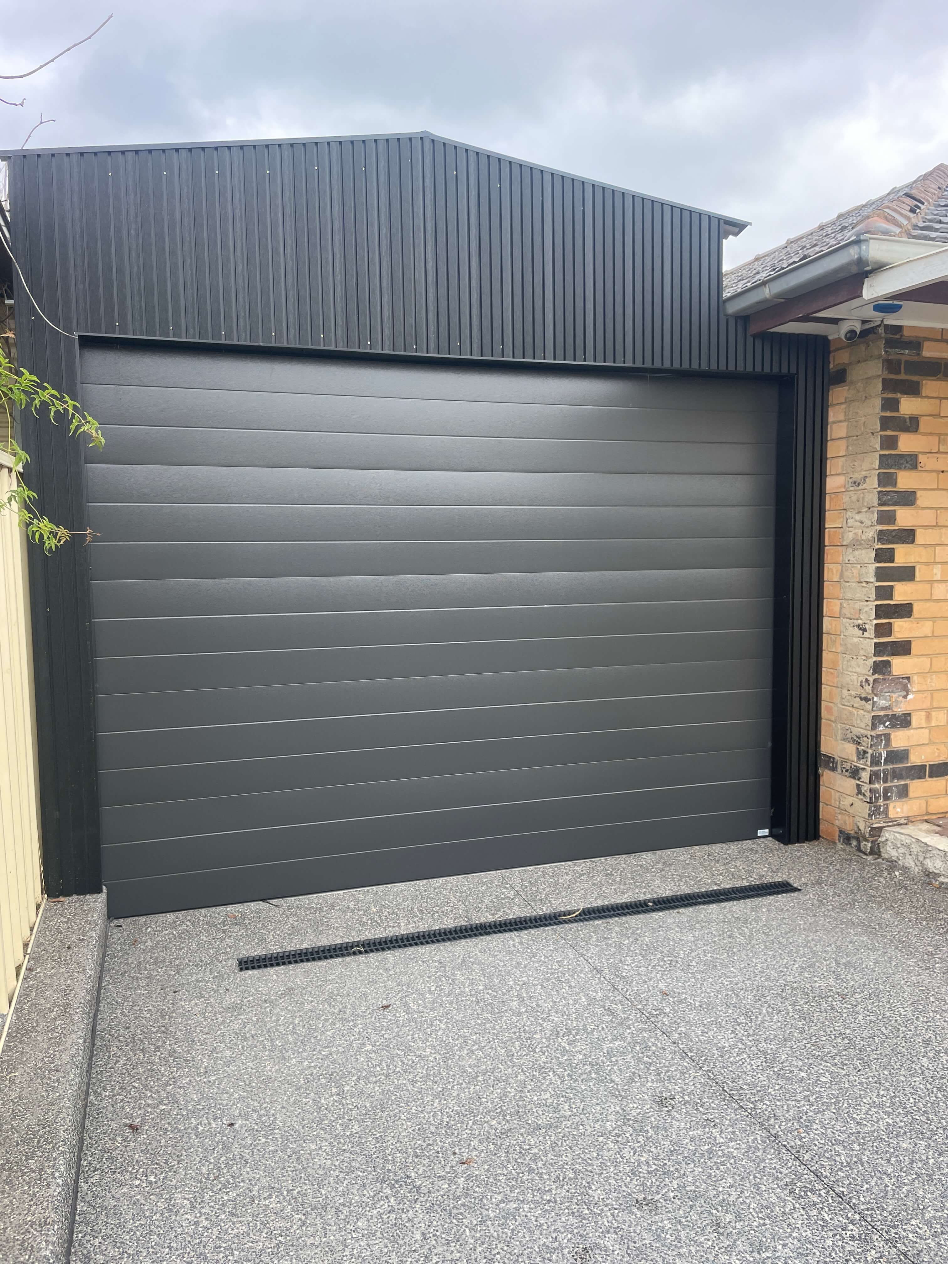 Tuscan Monument Sectional Door.