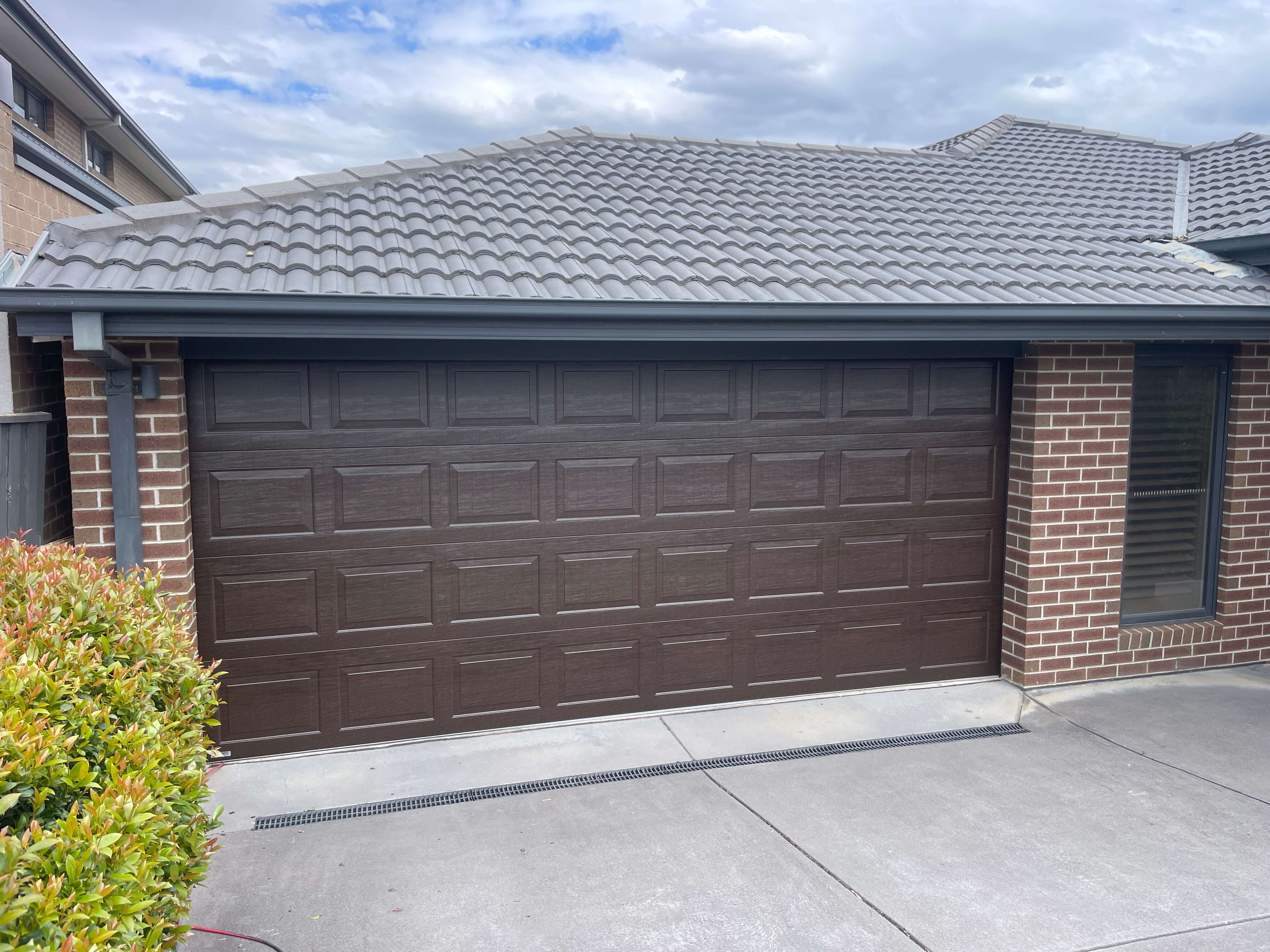 Walnut Oxford Sectional Door.