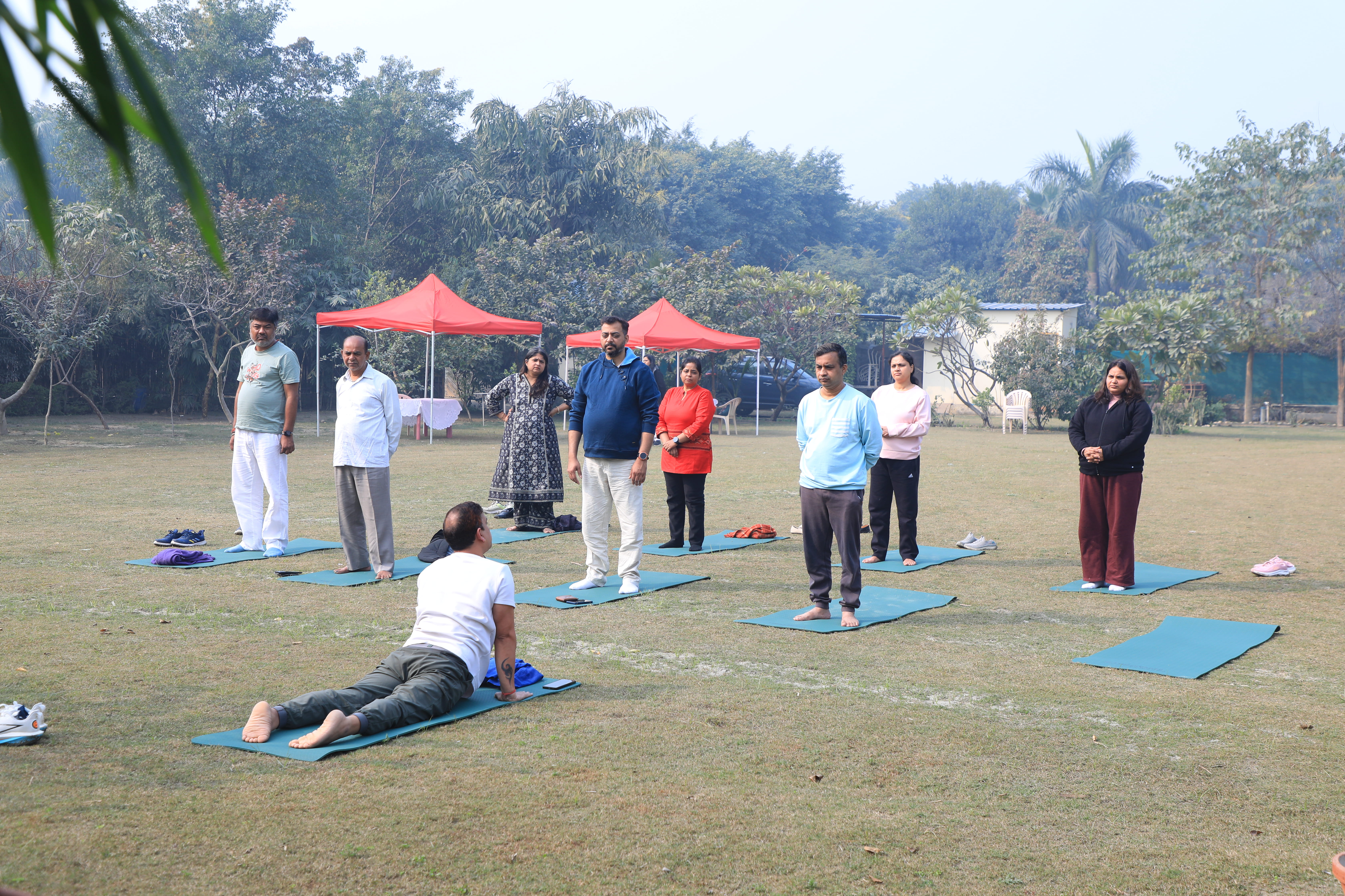 A group of people in a blissful state during a wellness retreat.