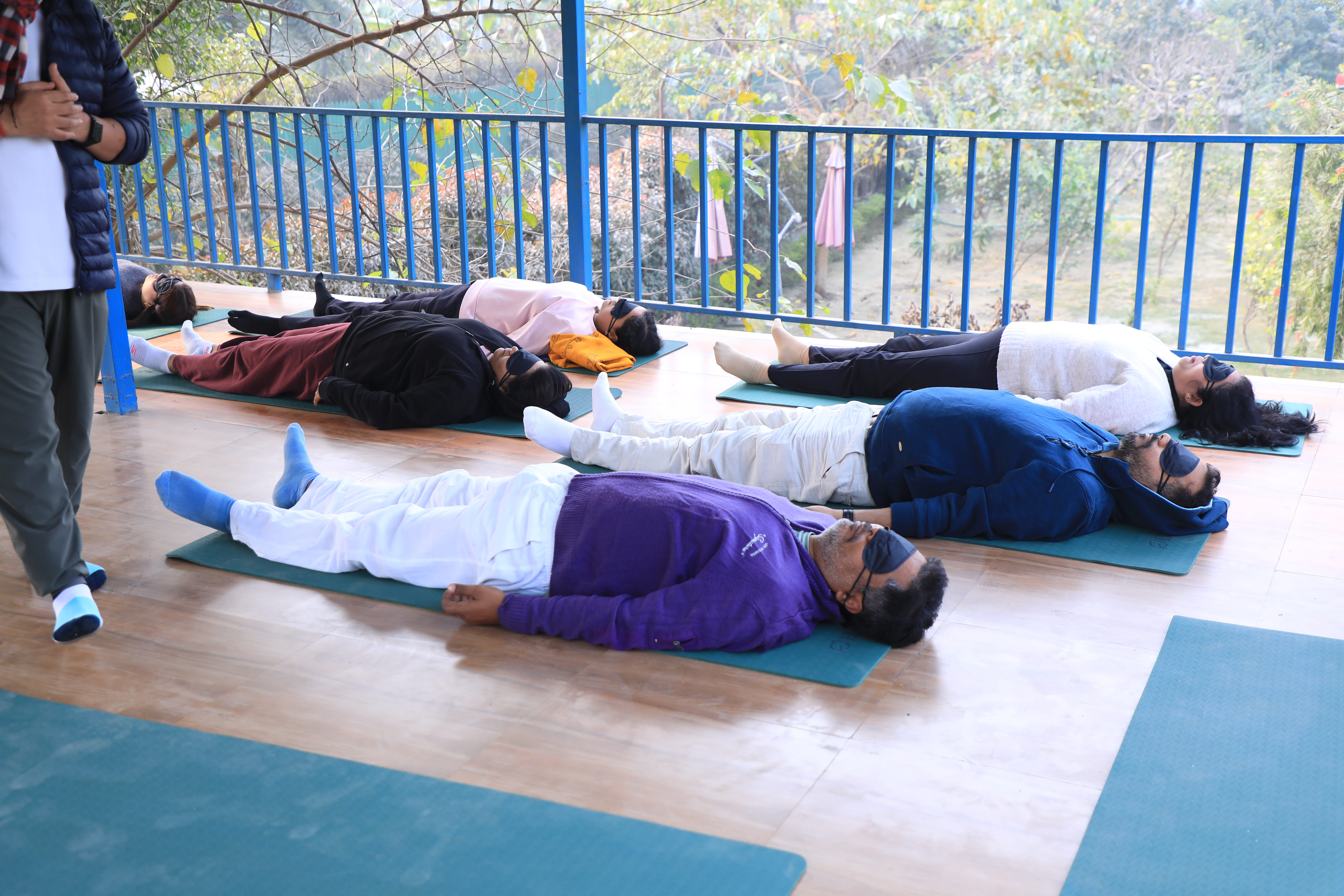 Participants engaged in a group activity at the wellness retreat.