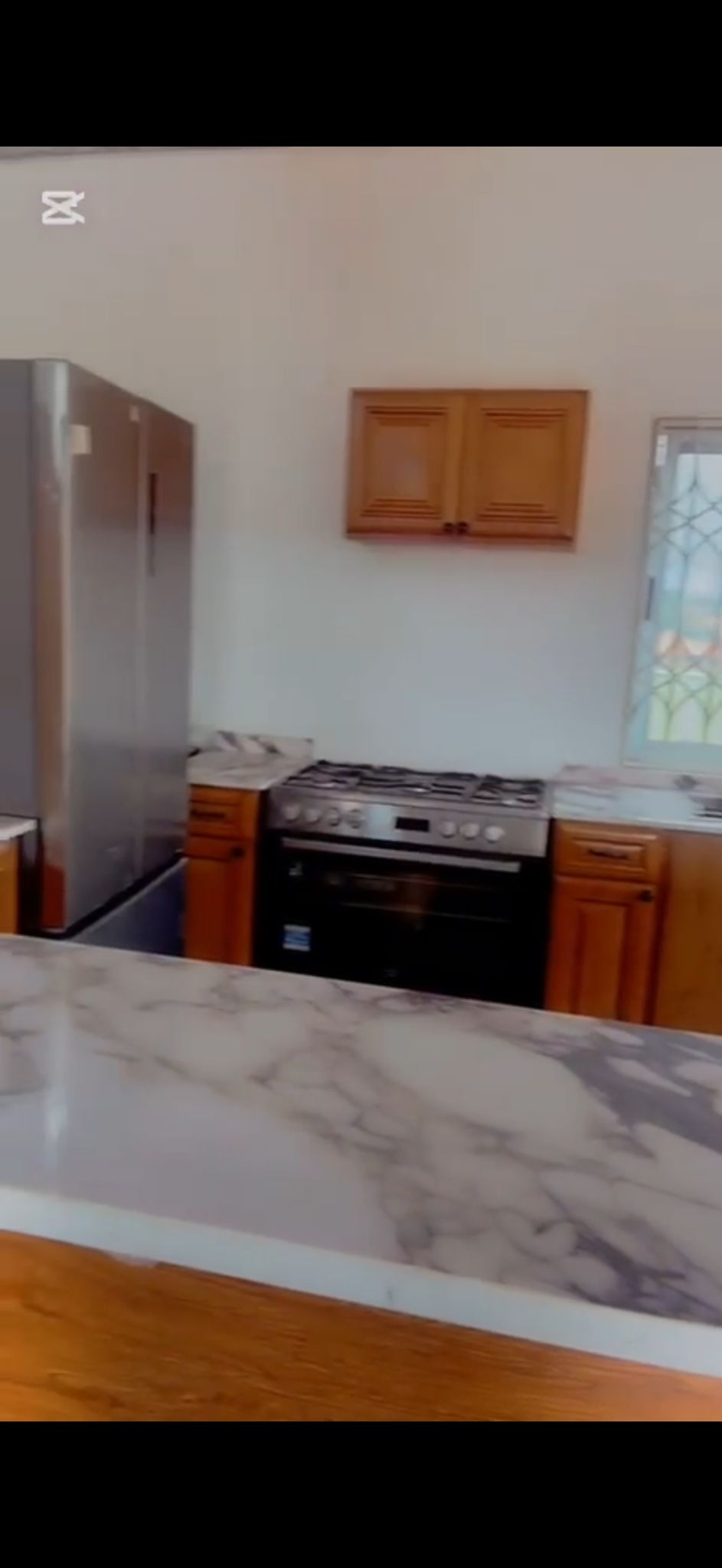 A modern kitchen setup for a catering class.