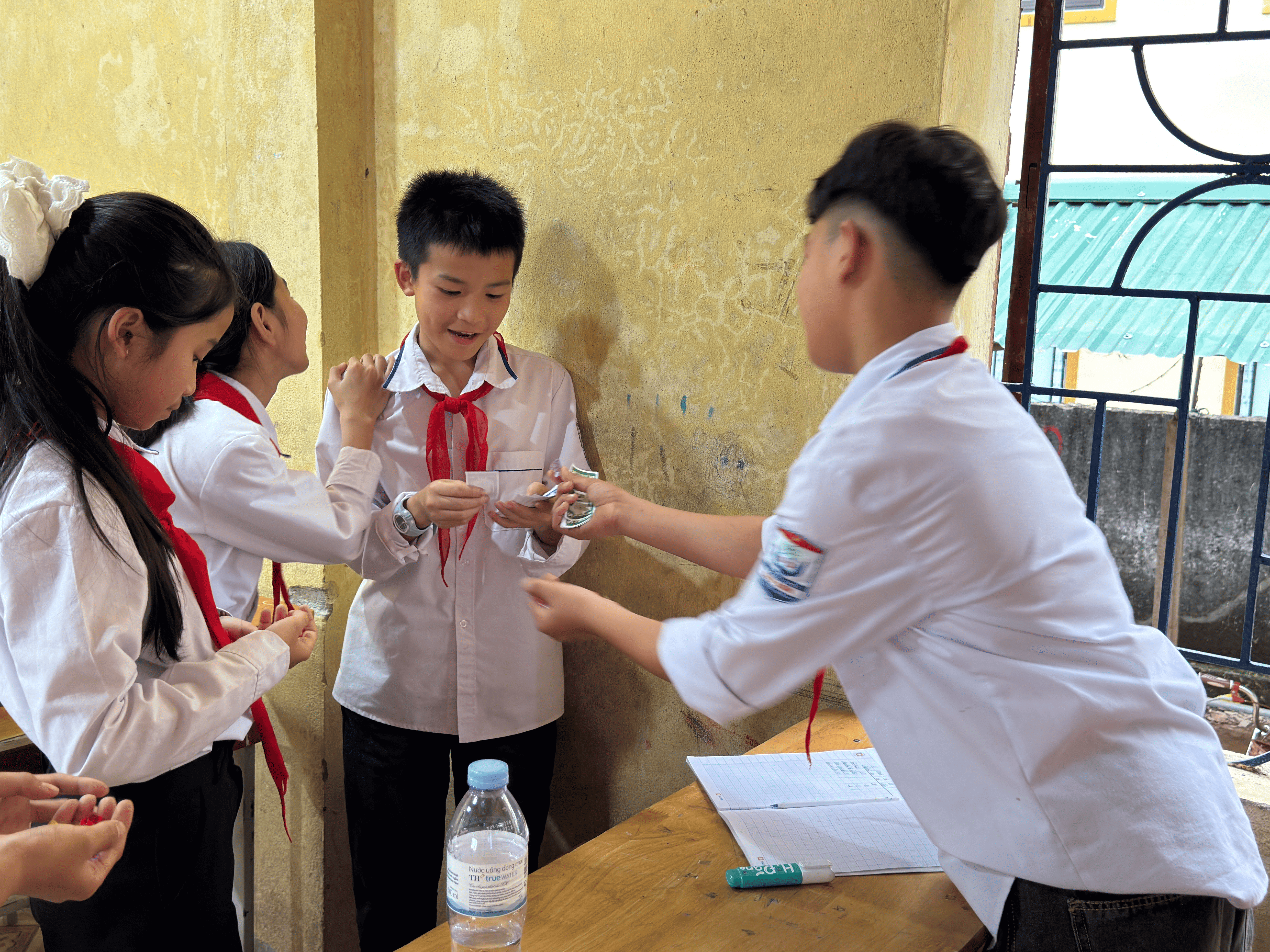 Numbers to Networks mentor working with a small group of students.