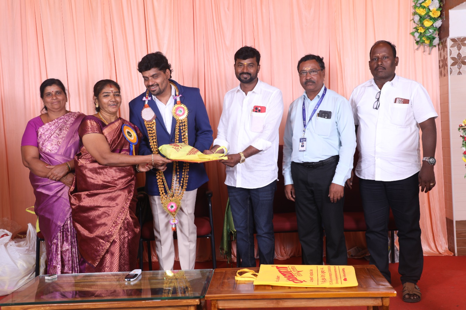 Rows of school uniforms ready for distribution.