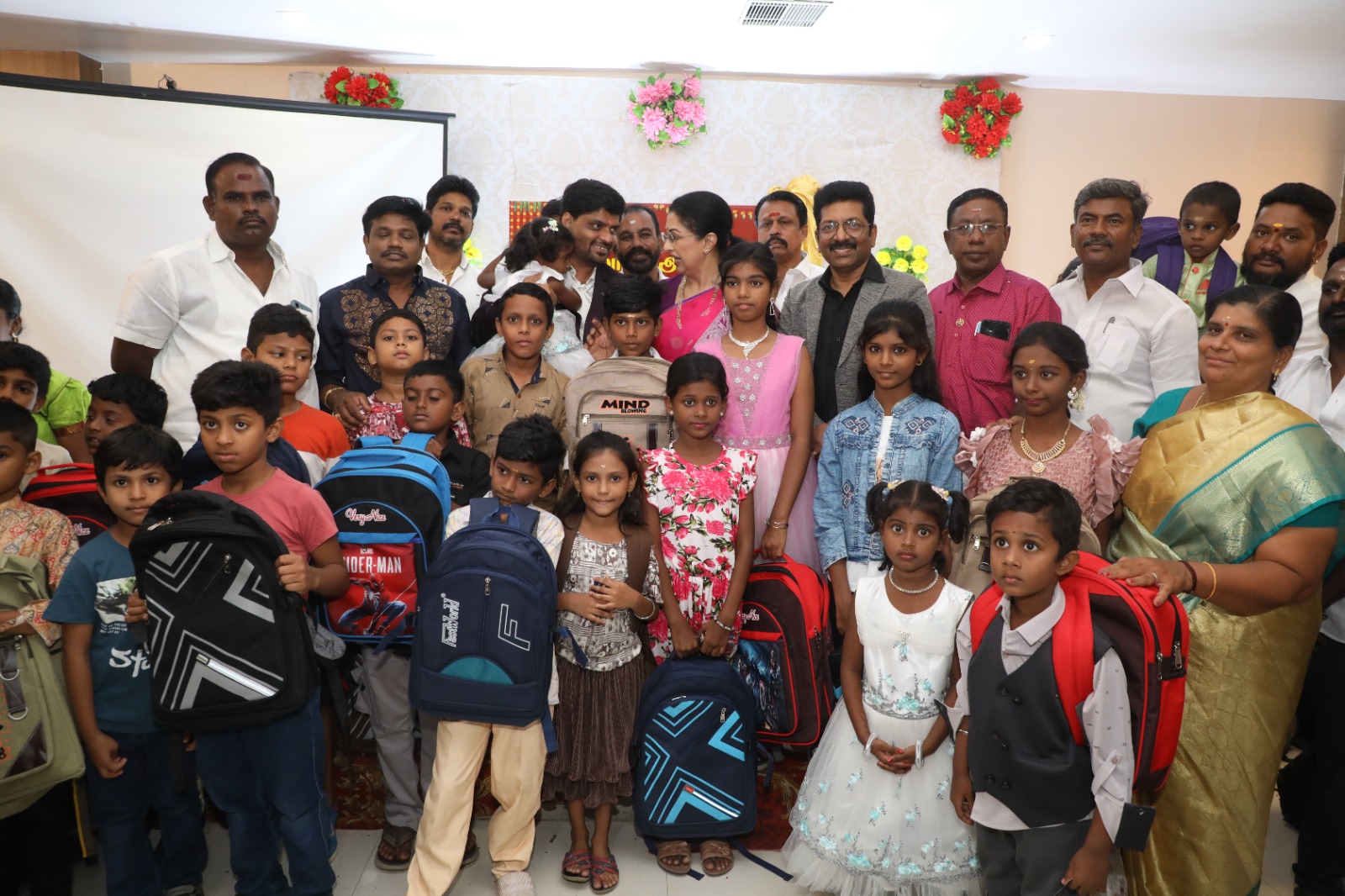 Children smiling at a community event.