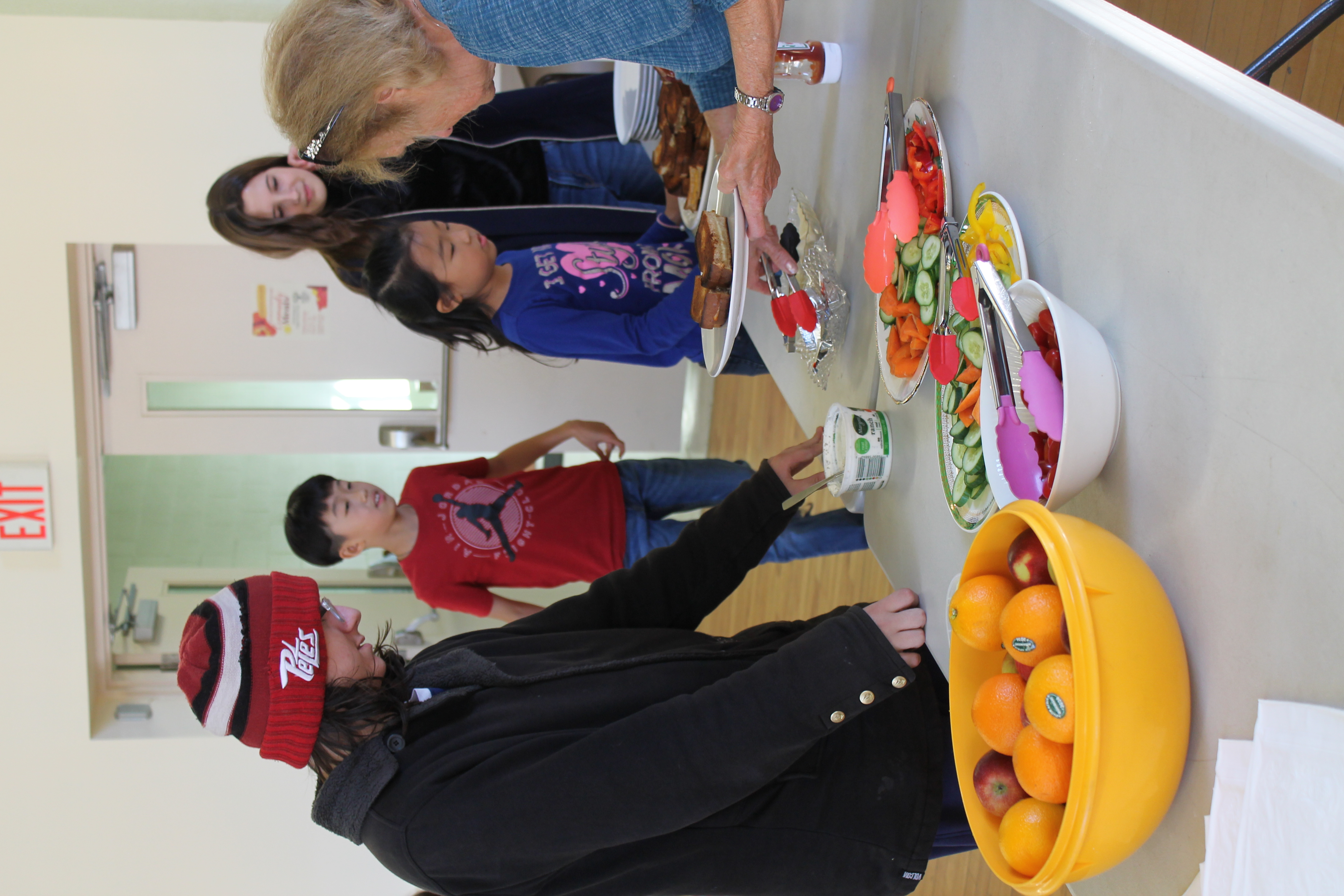 Volunteer serving snack