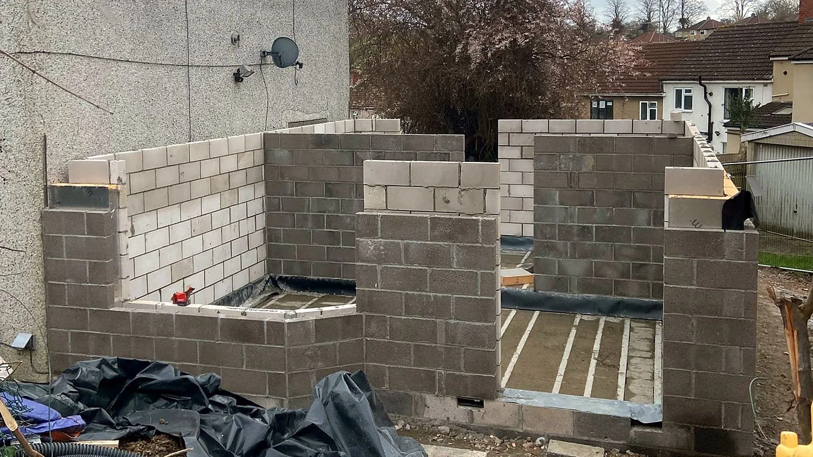 Groundworks contractors in Bristol at work: blockwork rising on our Brislington new build plot in March 2026