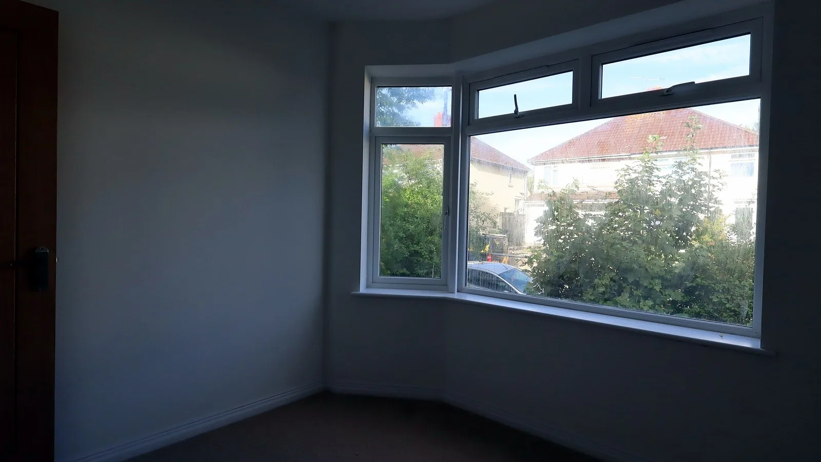 New white bay window in a finished bedroom in Brislington: do I need planning permission for new windows like these?